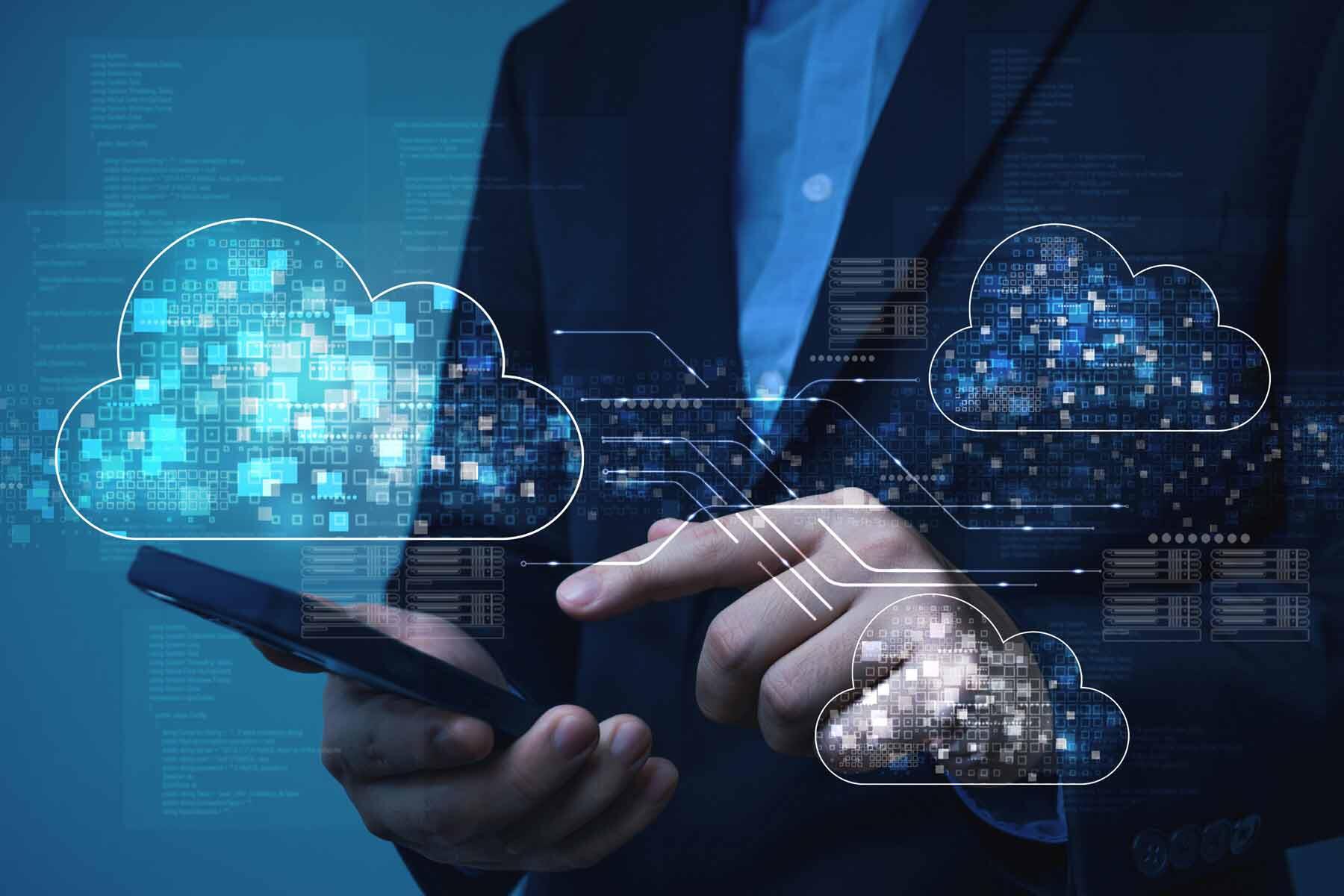 A man using his mobile phone, demonstrating the concept of cloud computing technology