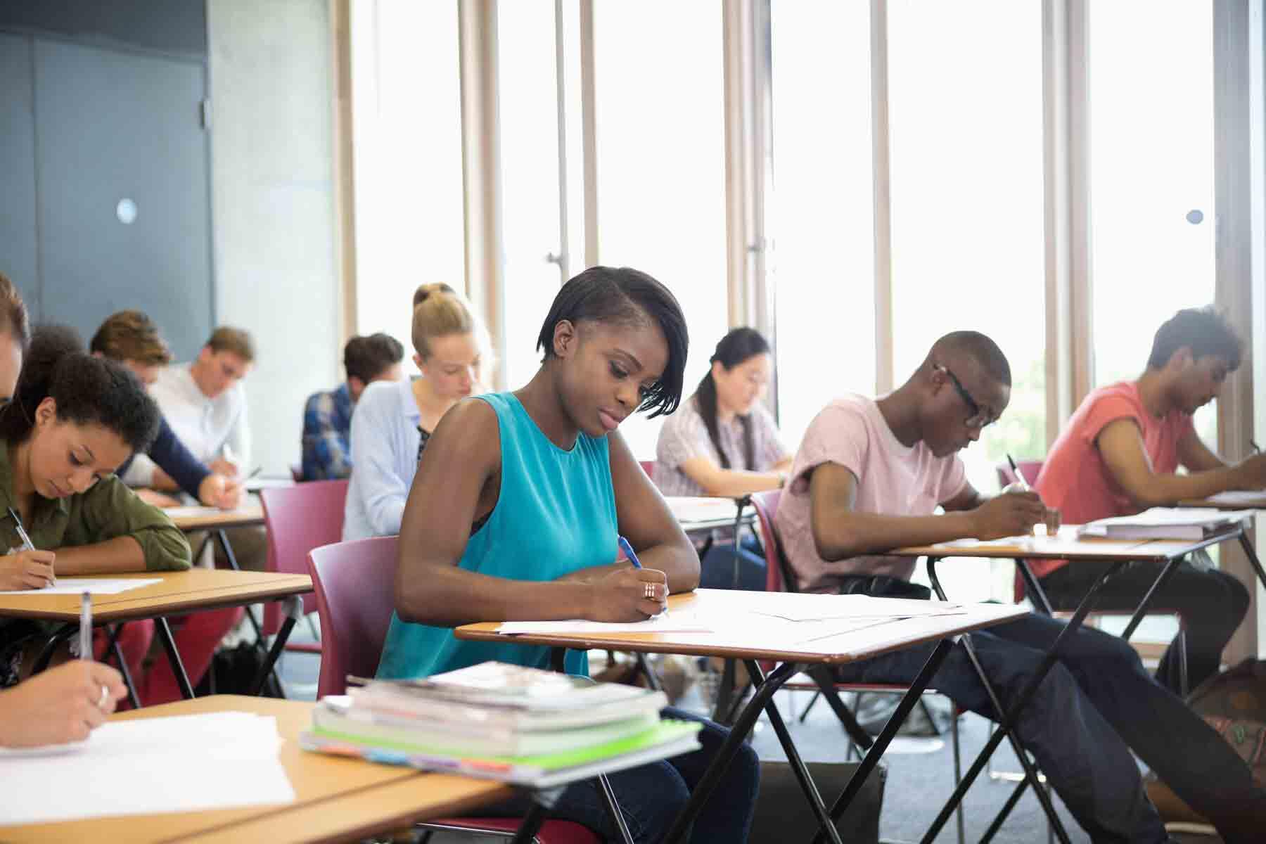 High school students taking the SAT exam.