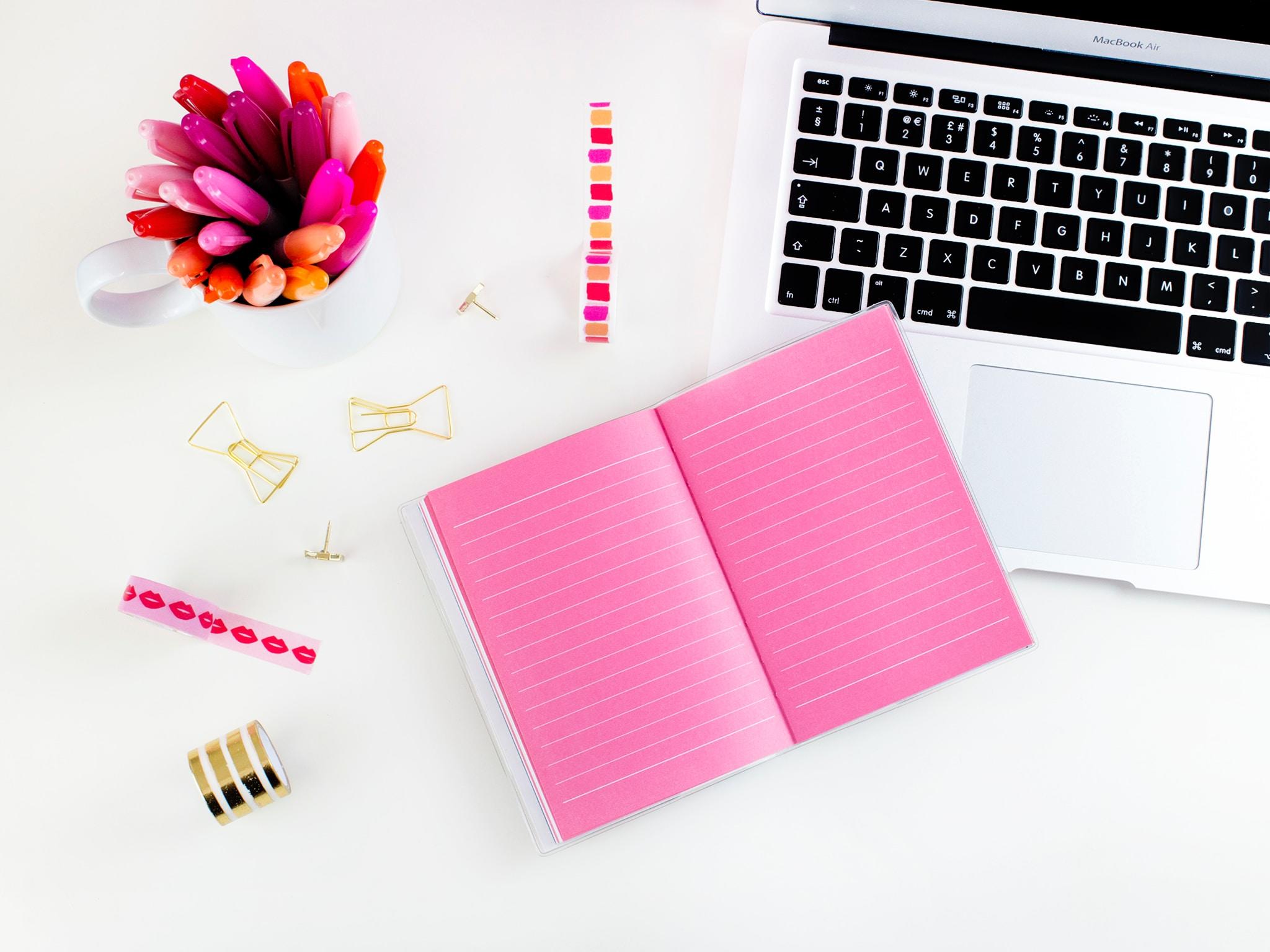 Notebook and Laptop on Desk