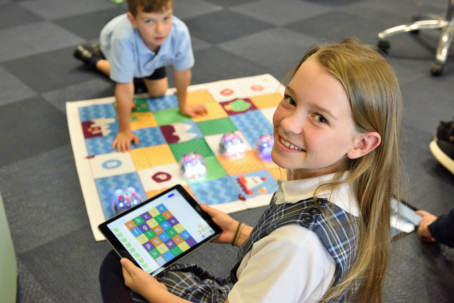 boy and girl playing in class