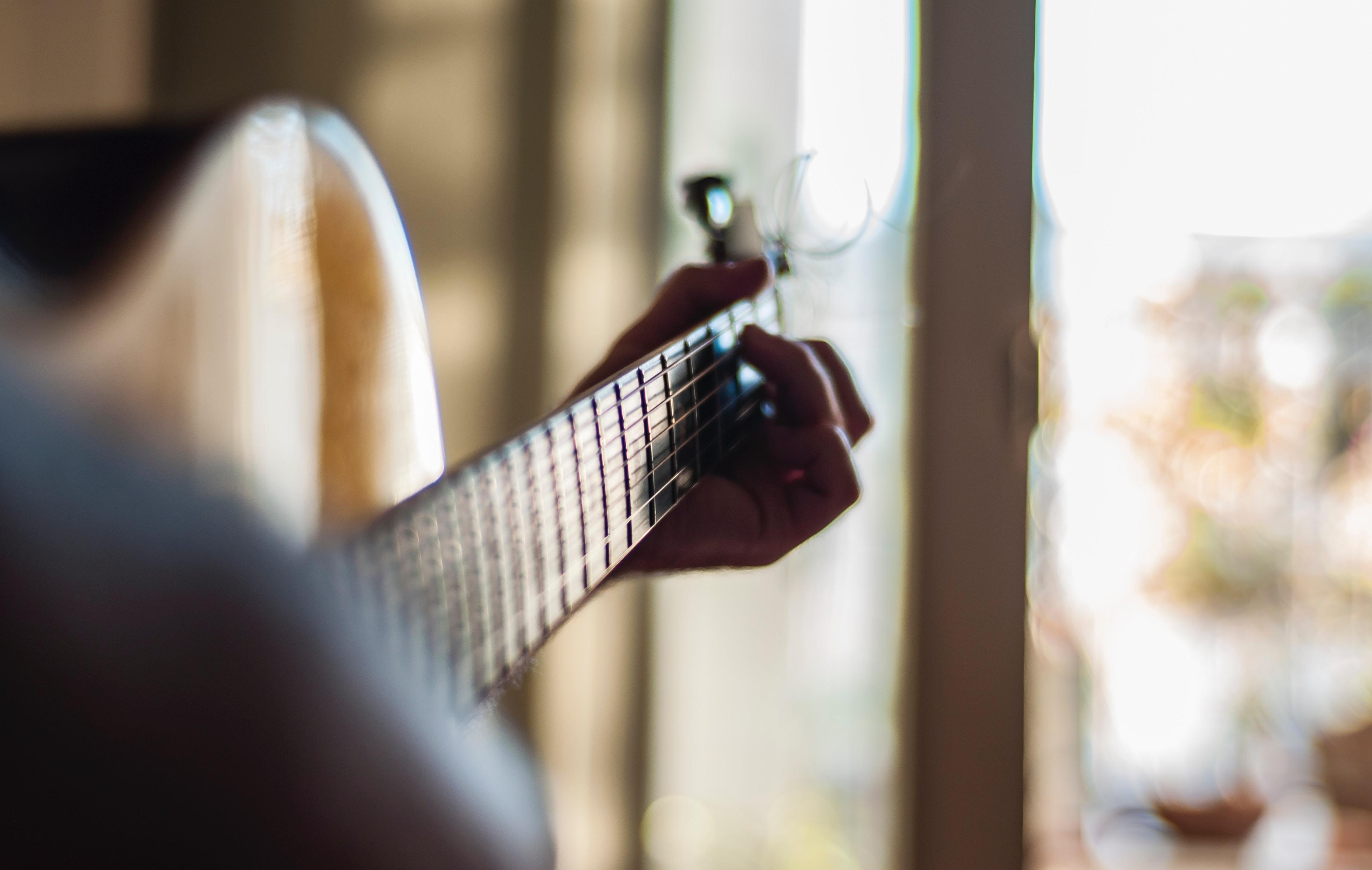 guitarist strumming