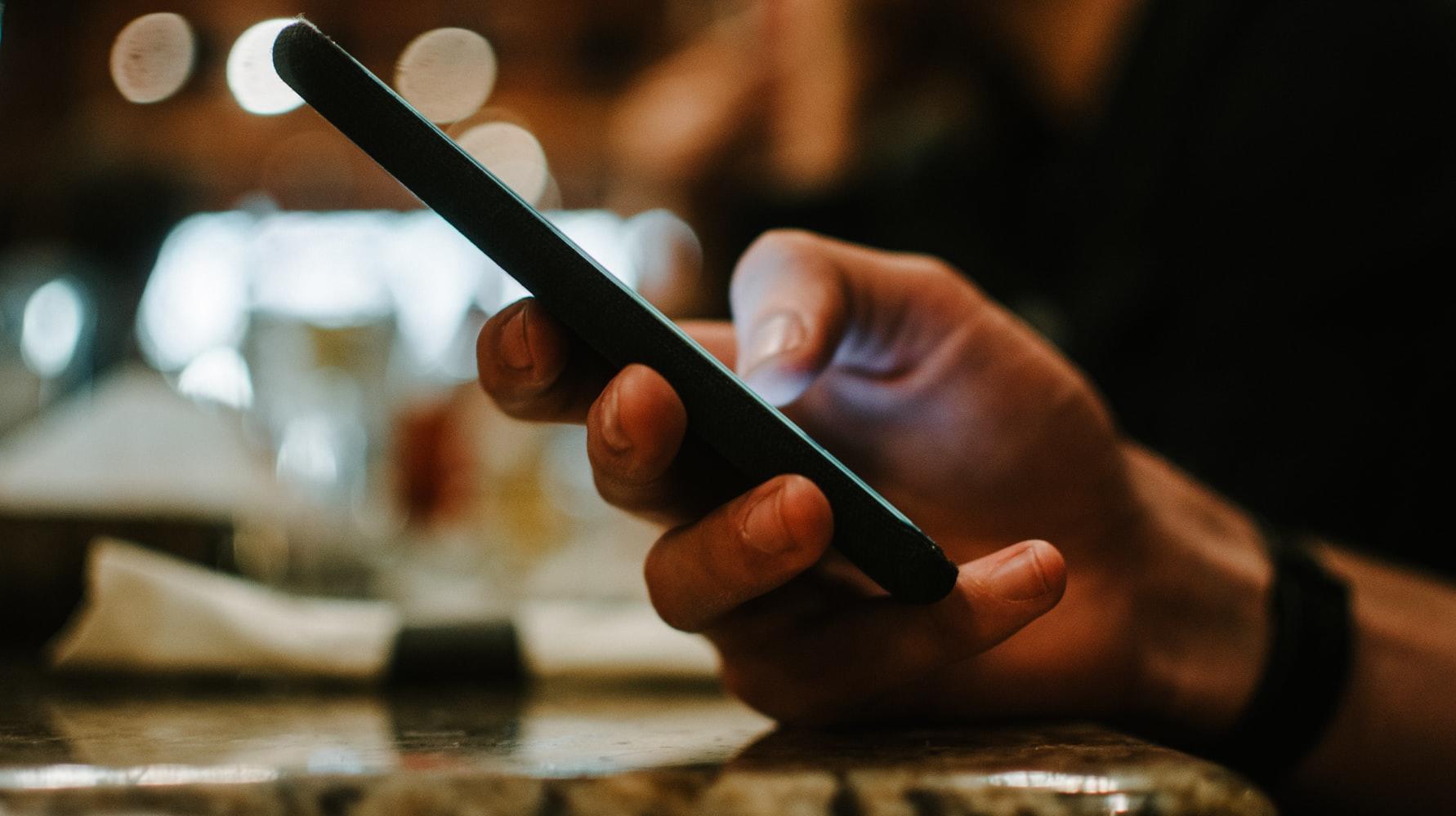 person using smartphone