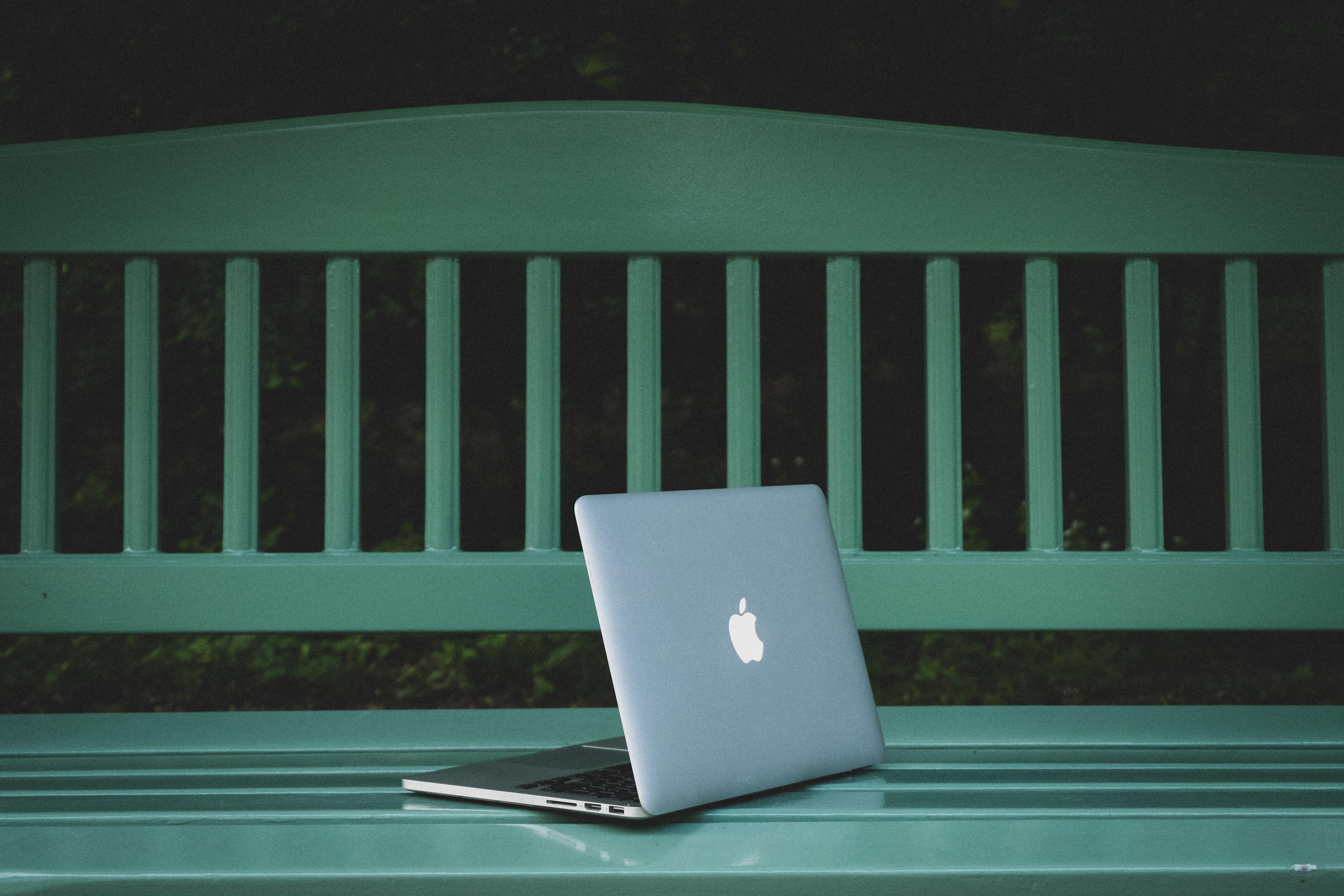 MacBook on bench
