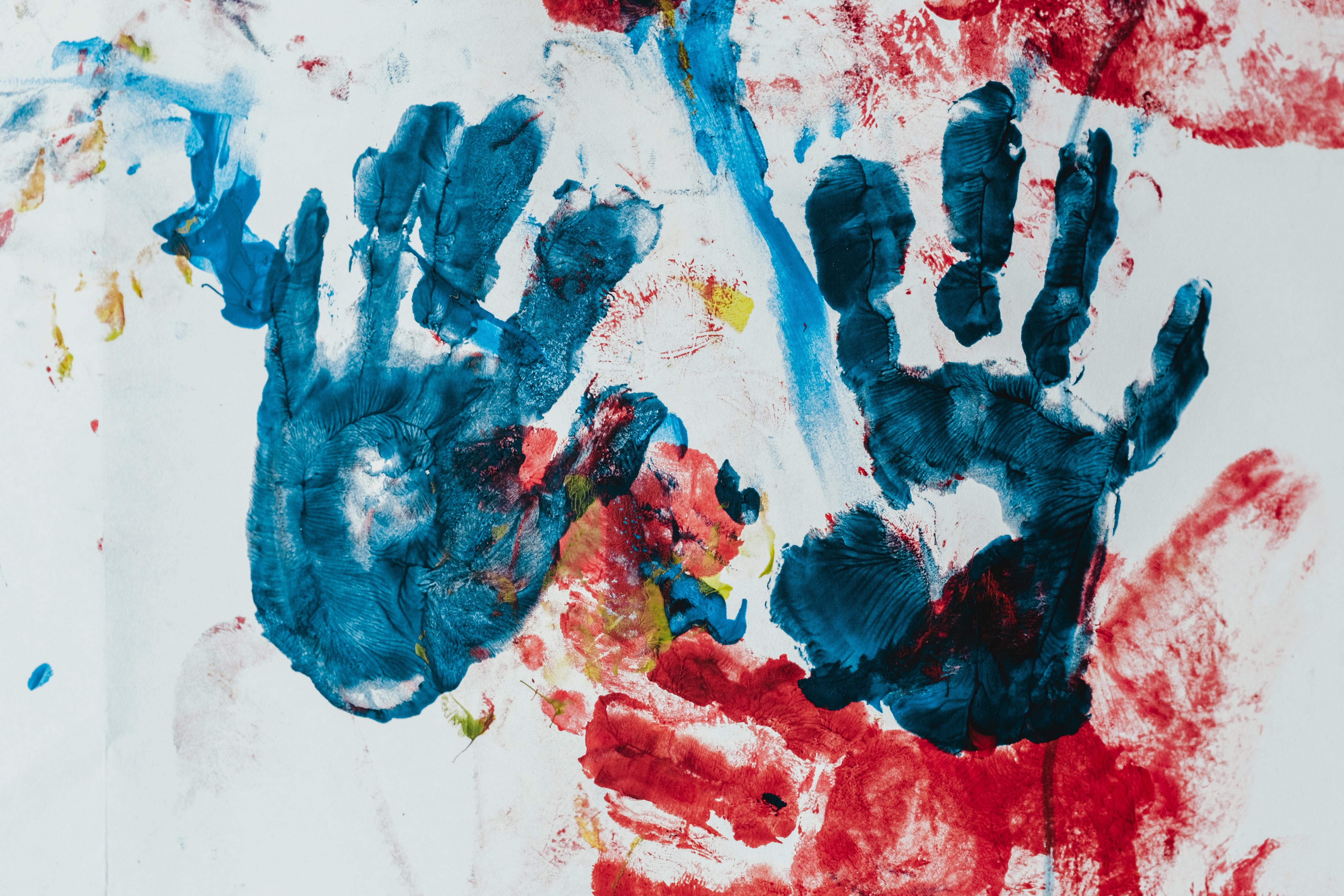 child's handprints in paint