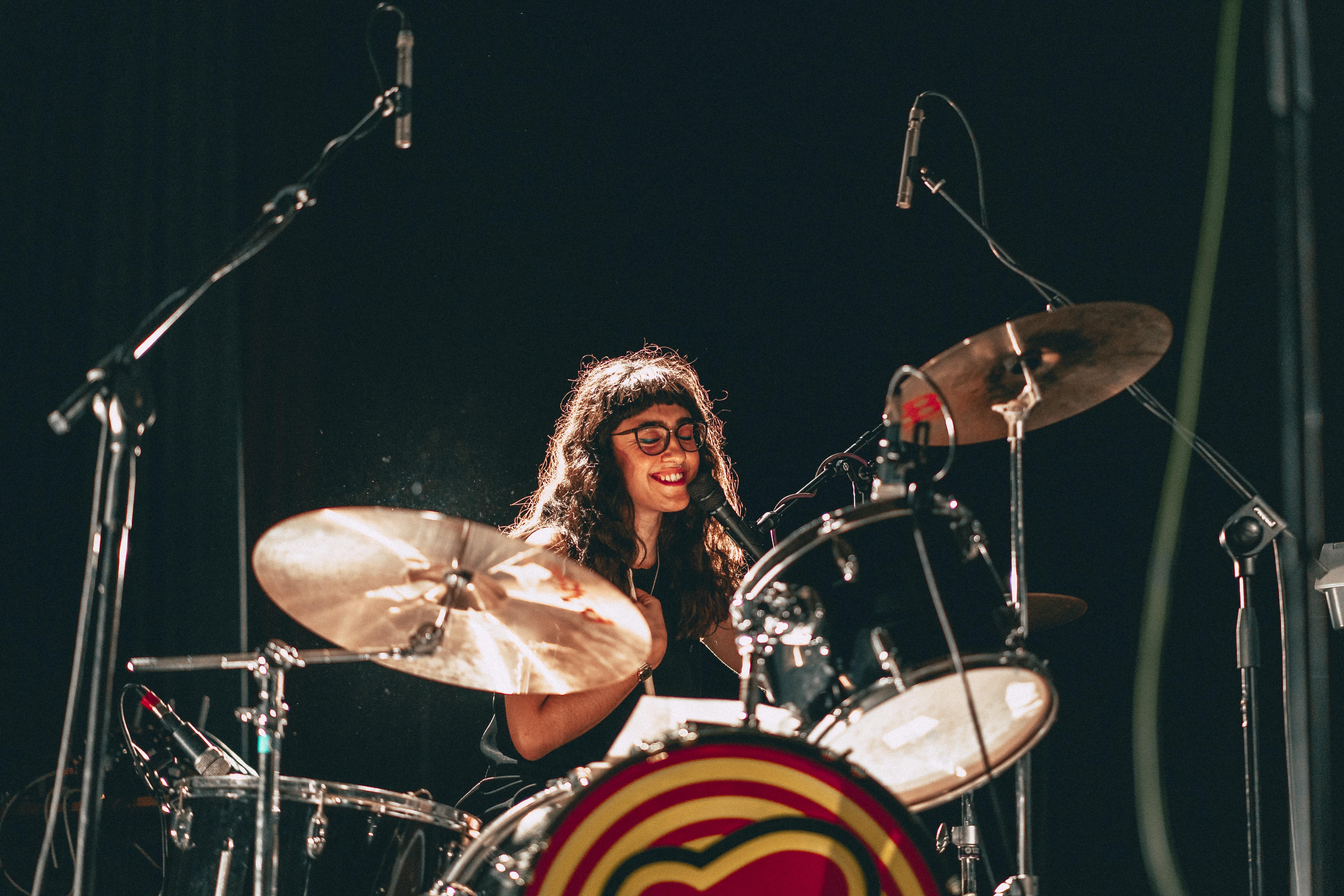 woman playing drums