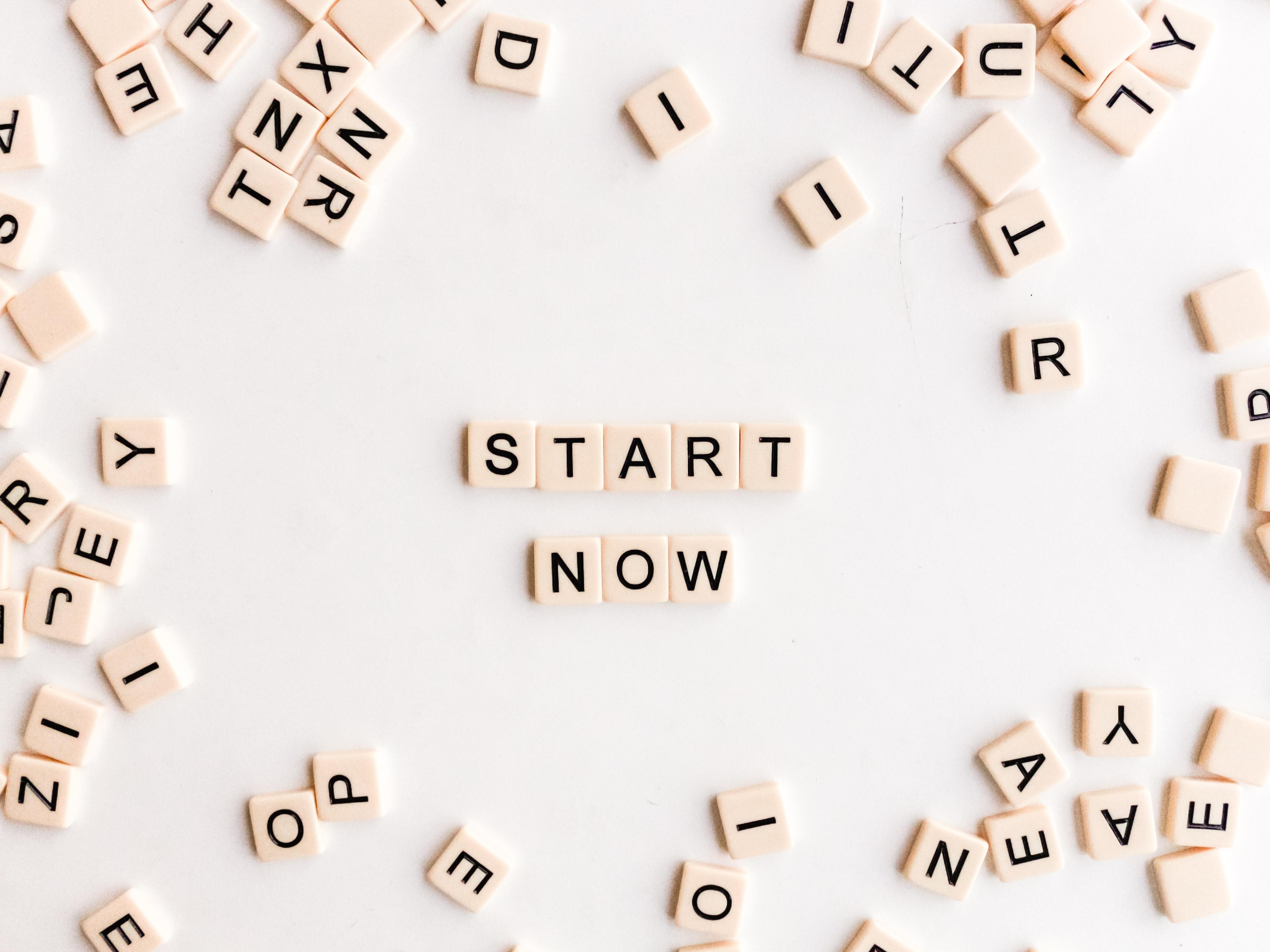 Start Now written with scrabble tiles