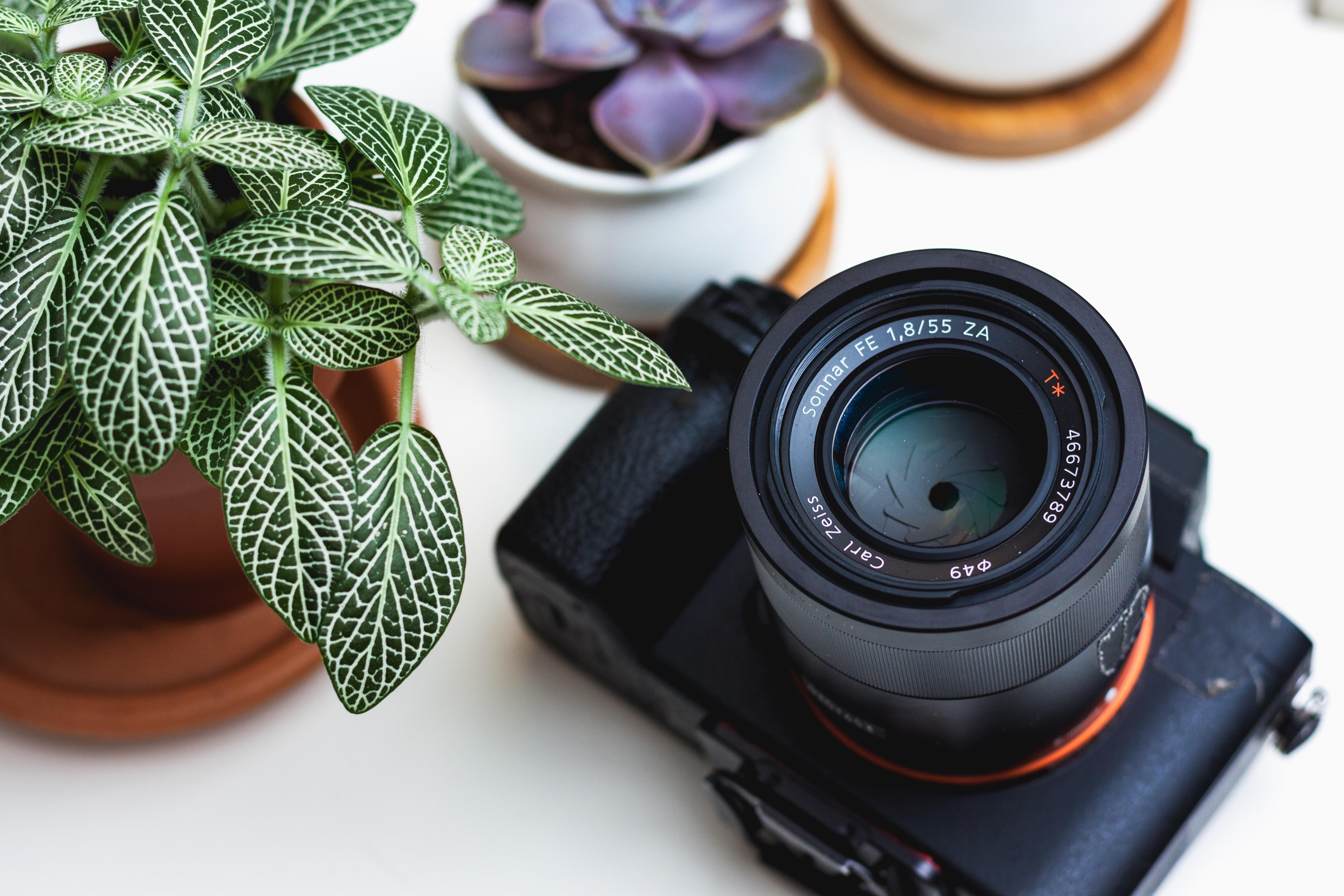 black camera on white desk