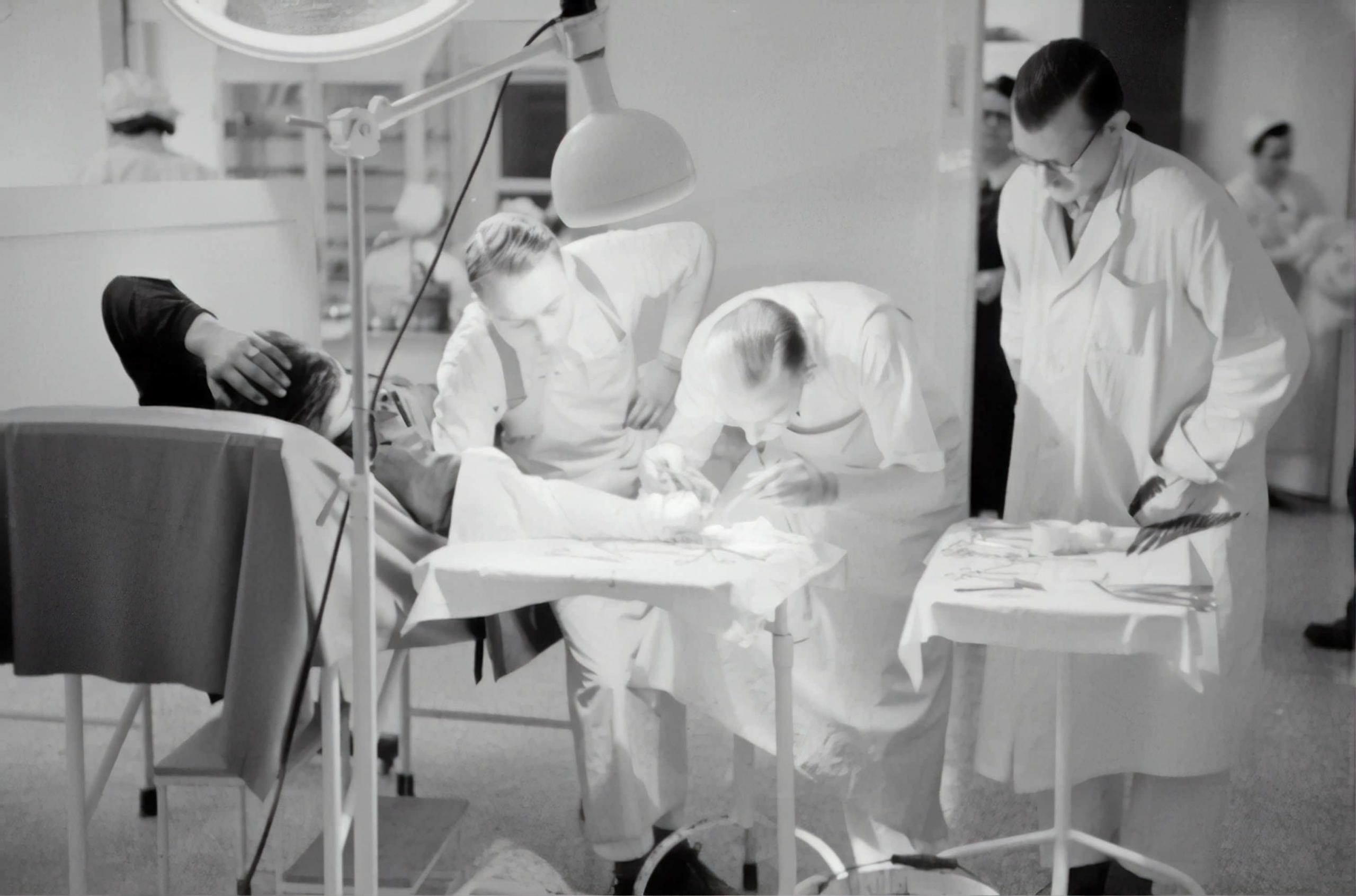 doctors tending to patient