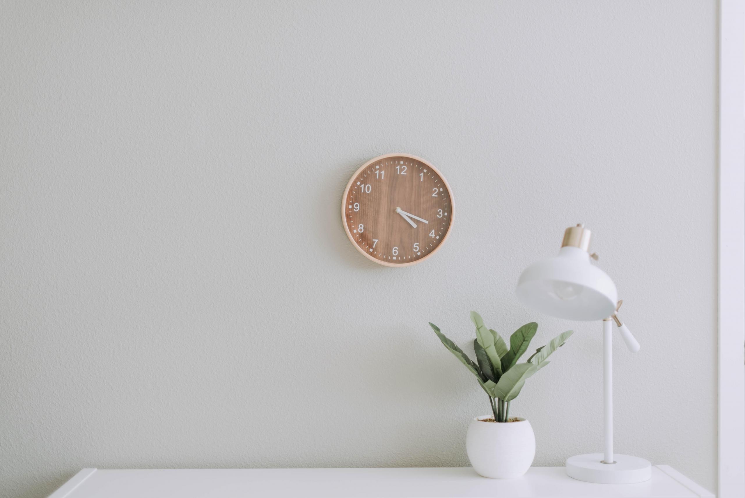 wall clock above desk