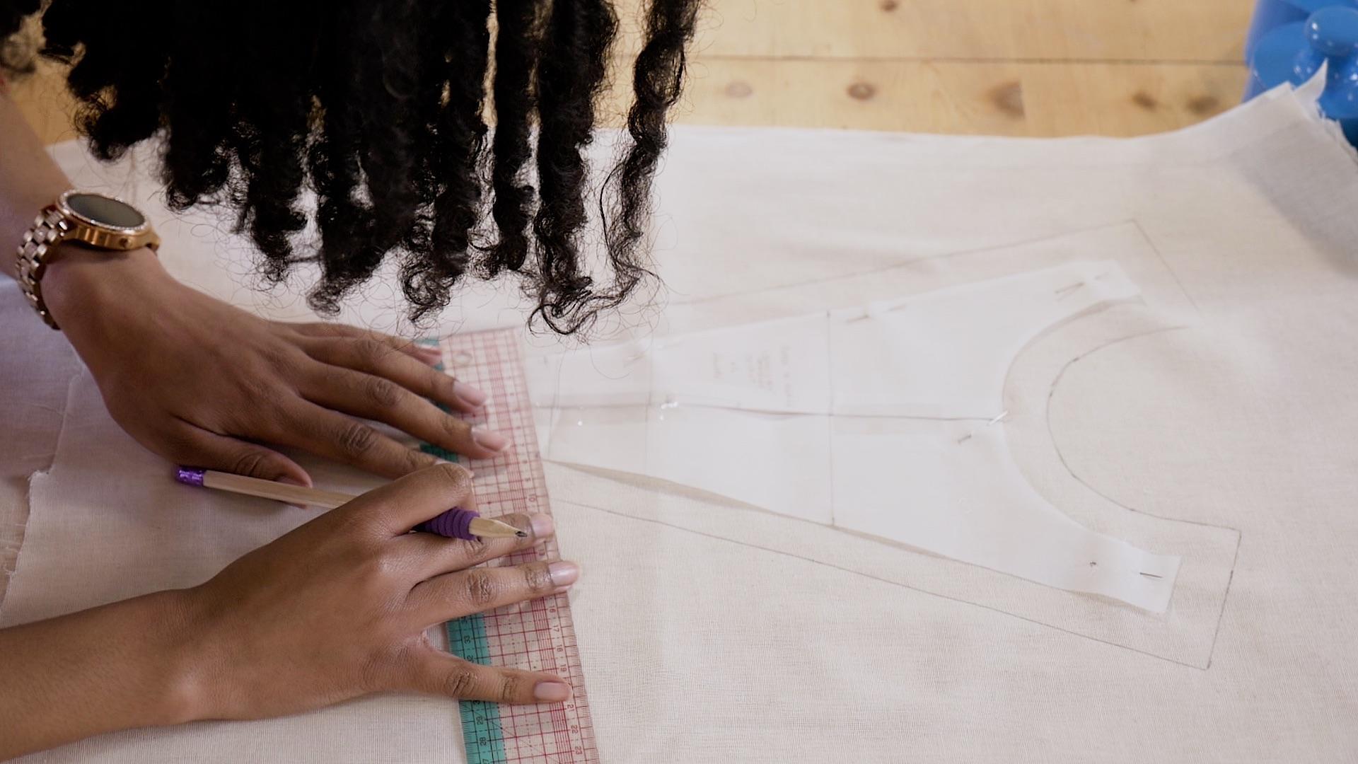 fashion designer creating a pattern