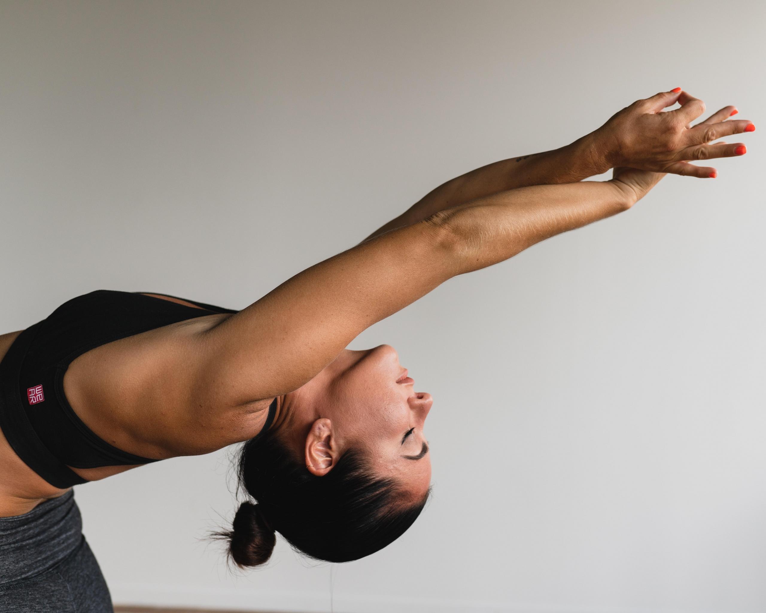 woman doing a backward bend yoga posture