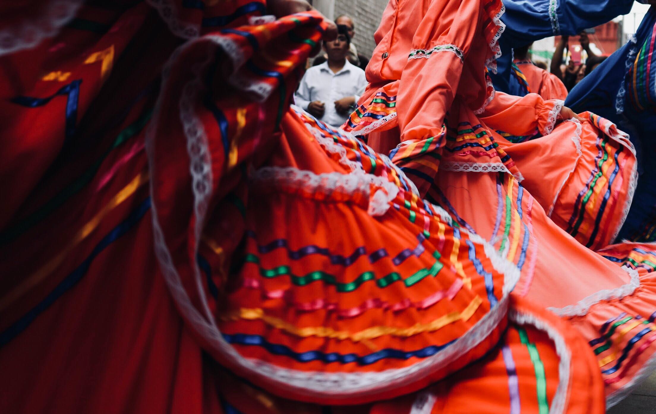 traditional Spanish dancers in red dresses