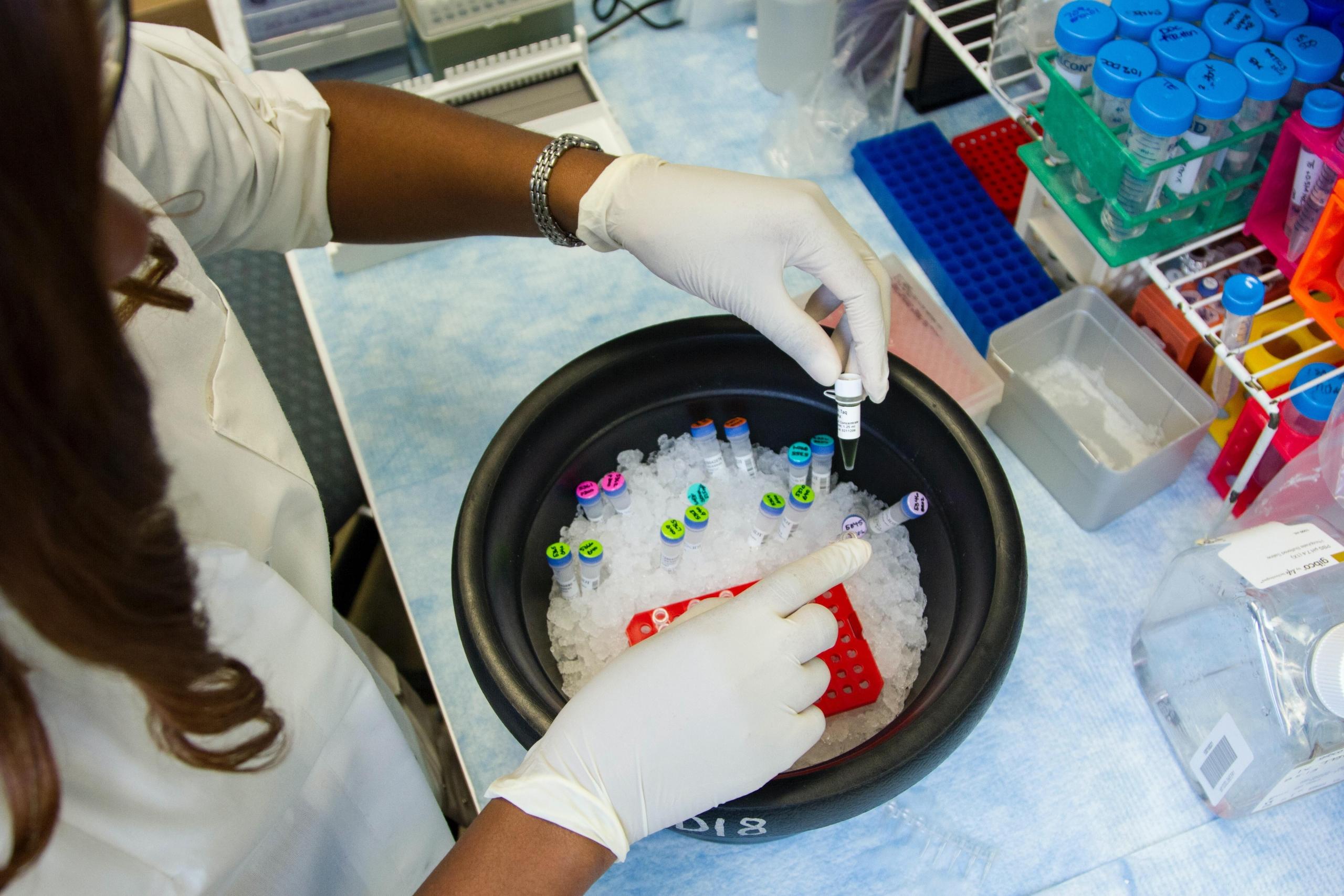 female scientist running experiments in lab