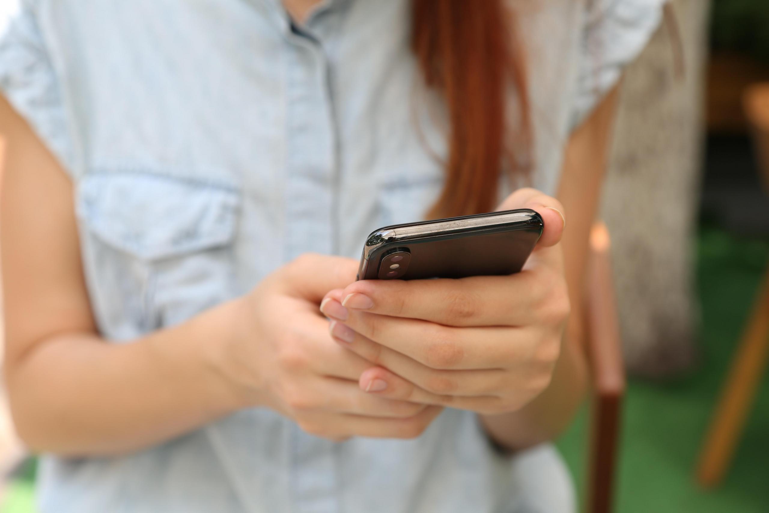 woman using smartphone