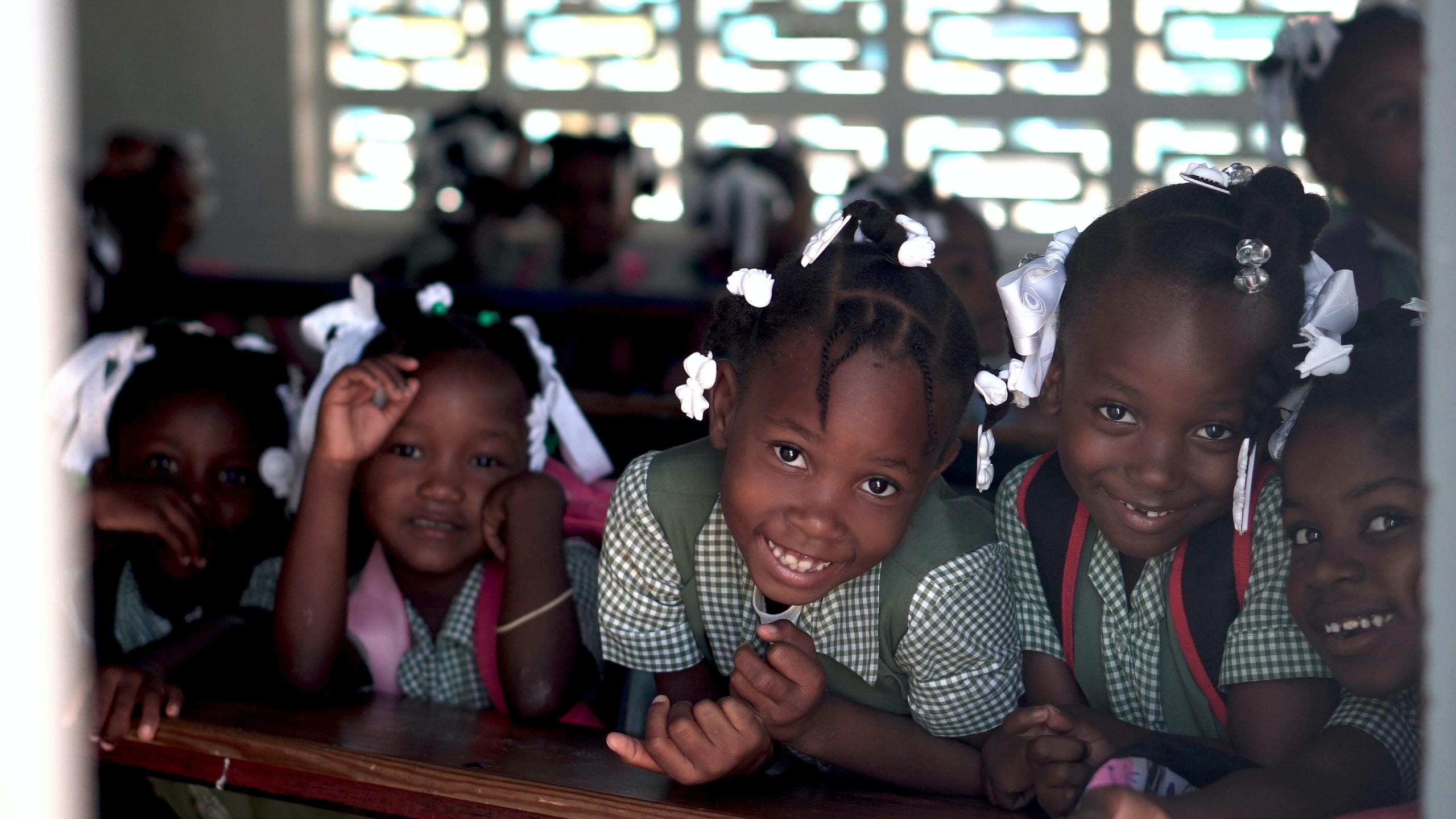 group of smiling primary school children