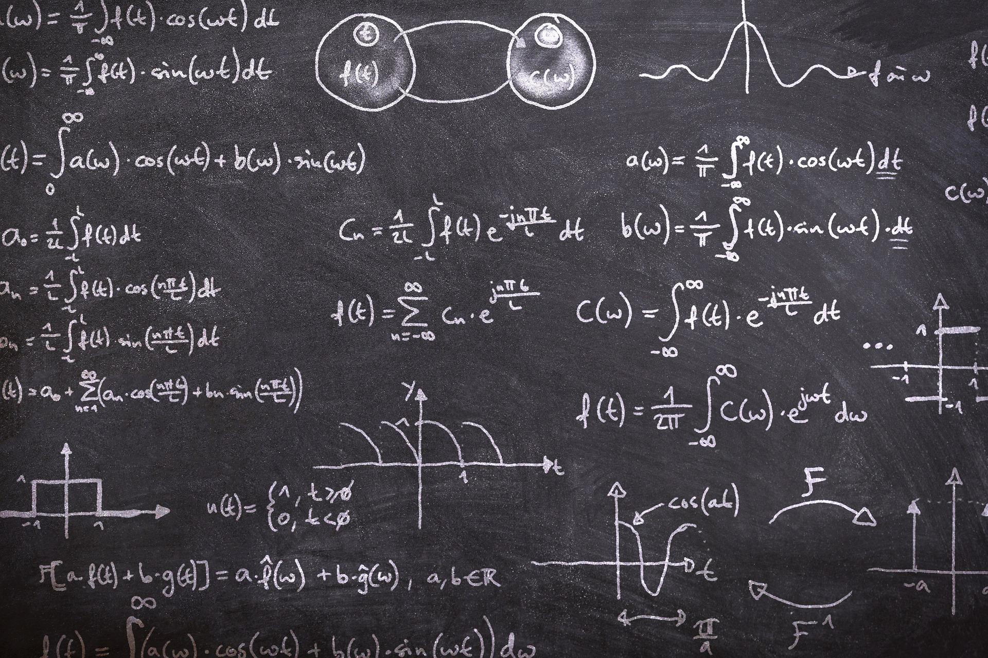 maths equations written on blackboard