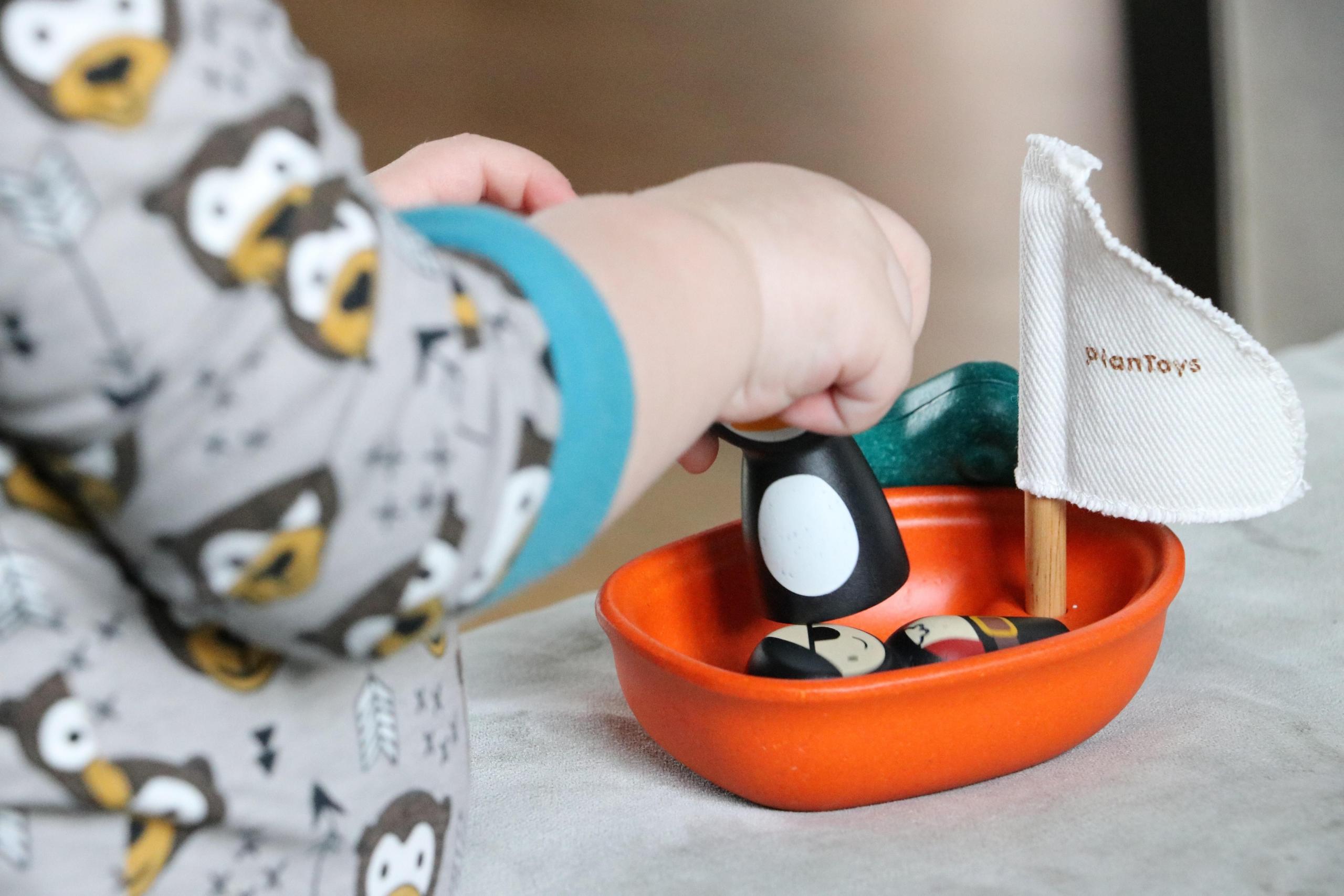 small child playing with toys