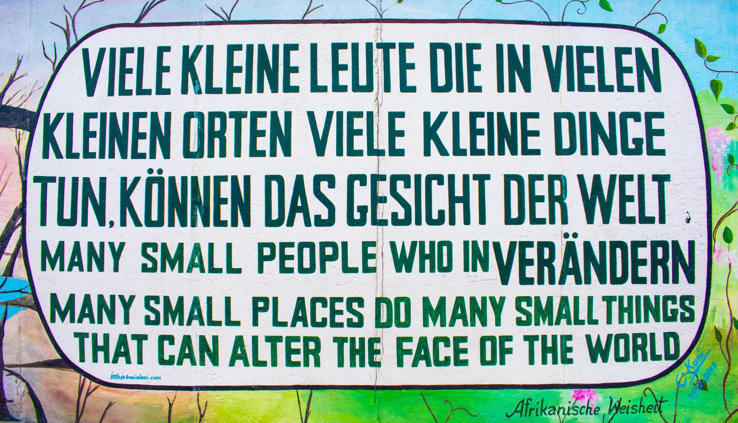 piece of Berlin wall with german quote