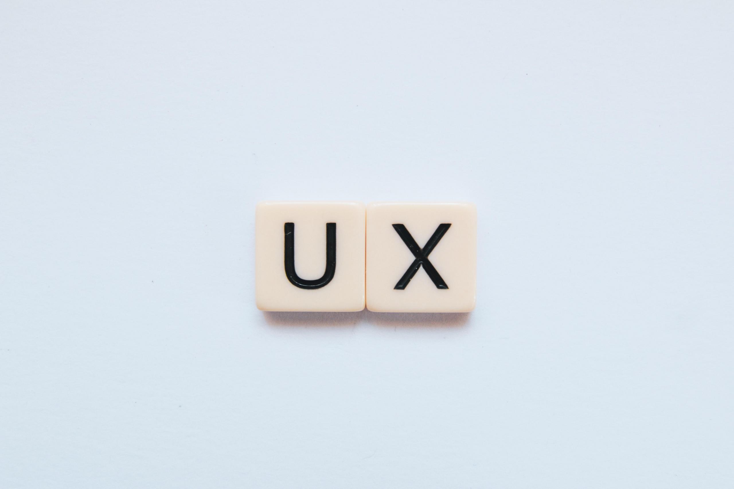 scrabble tiles spelling UX