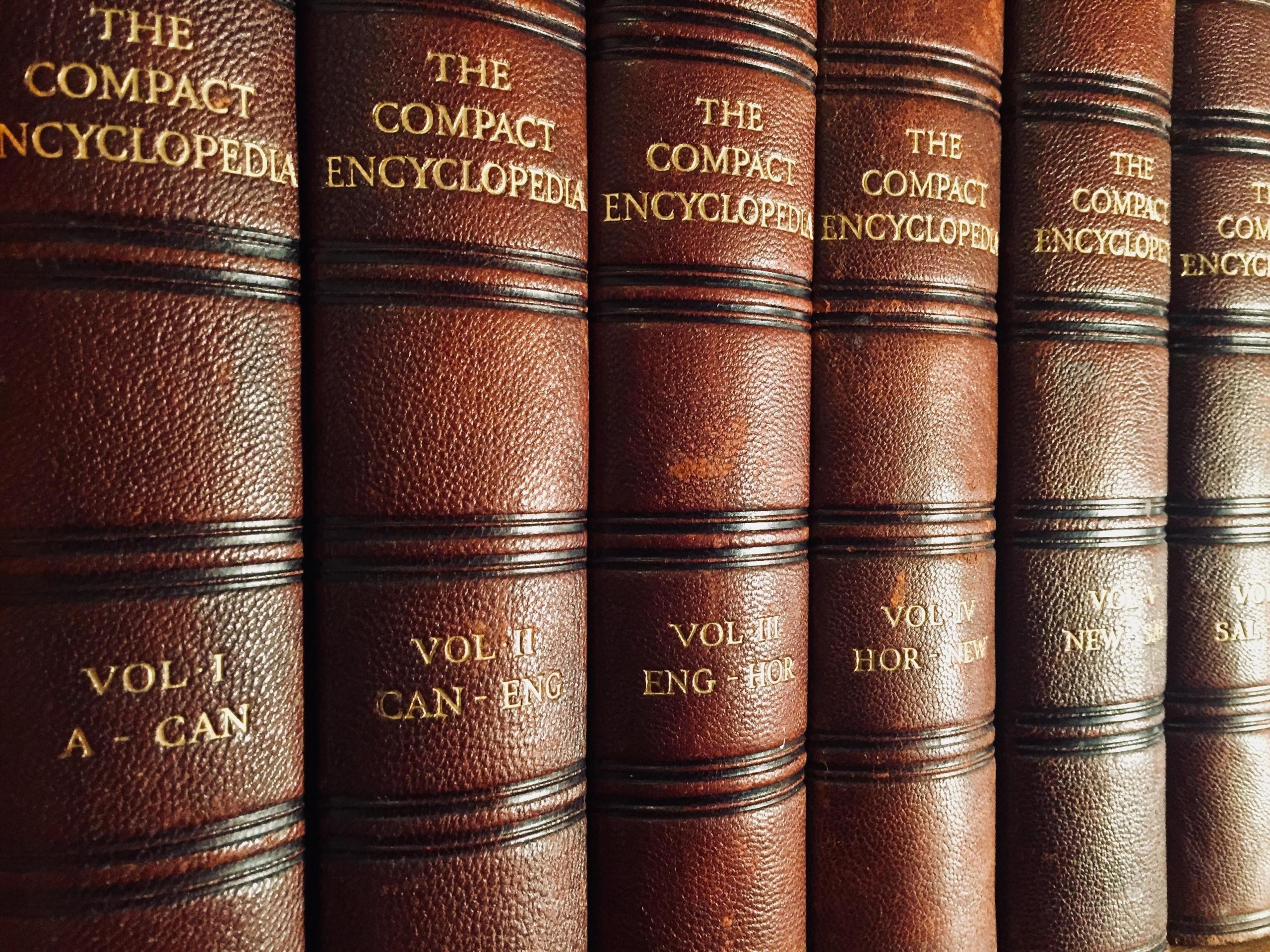 row of brown encyclopedias
