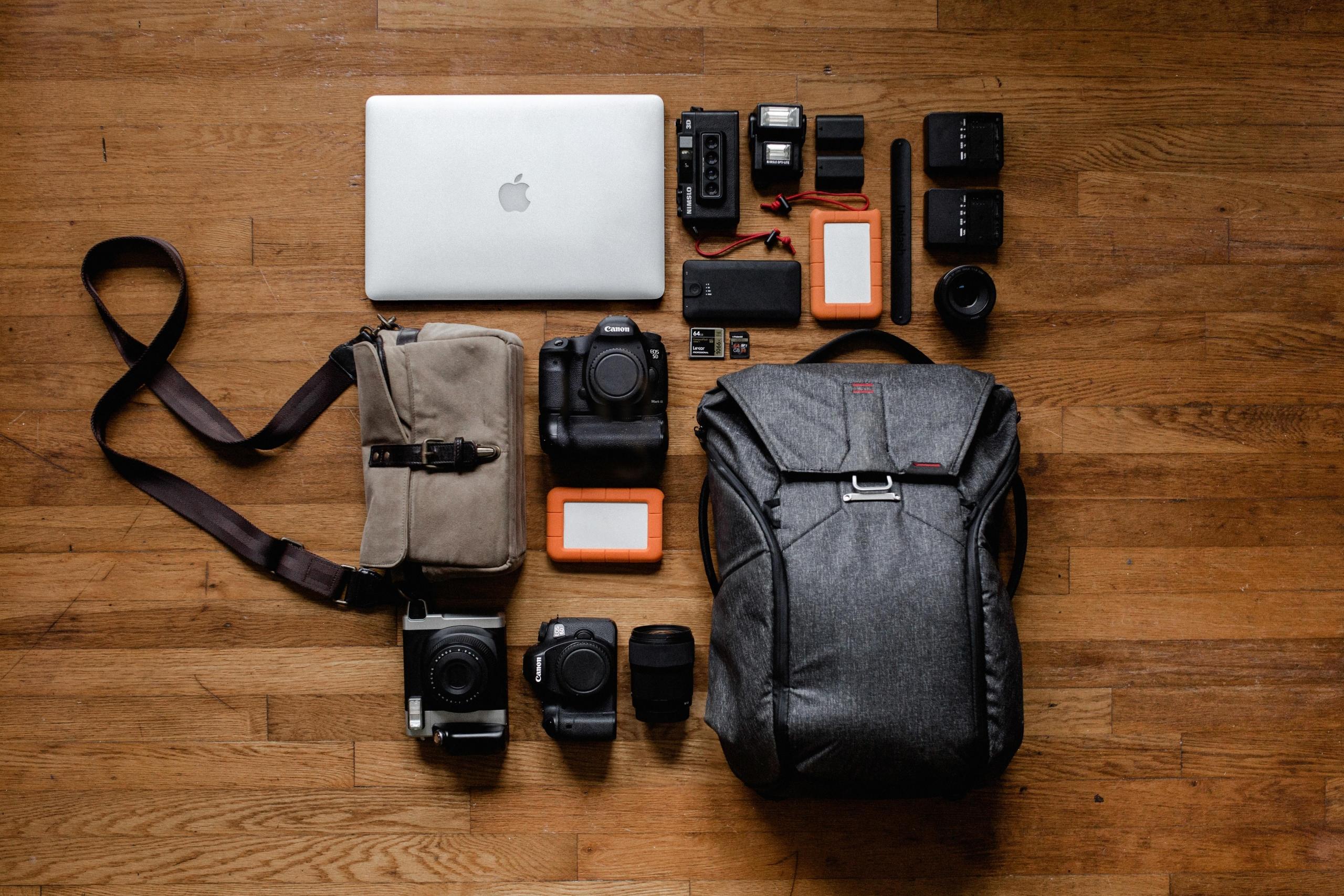 laptop, camera and camera lenses