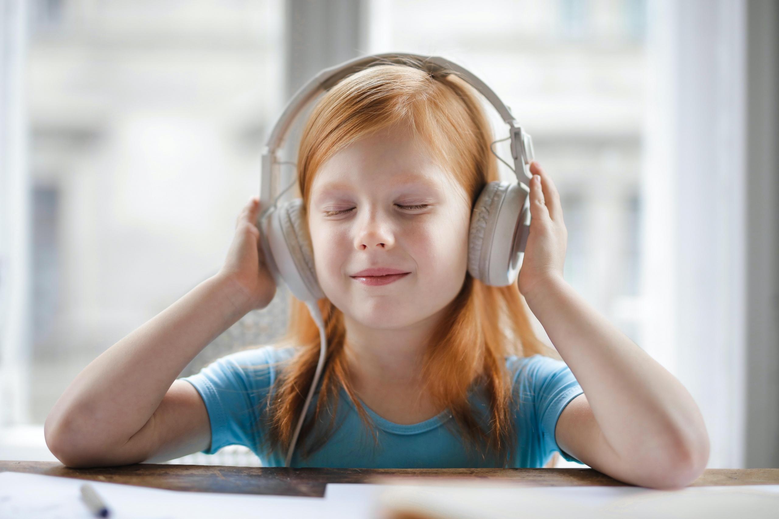 girl in white headphones