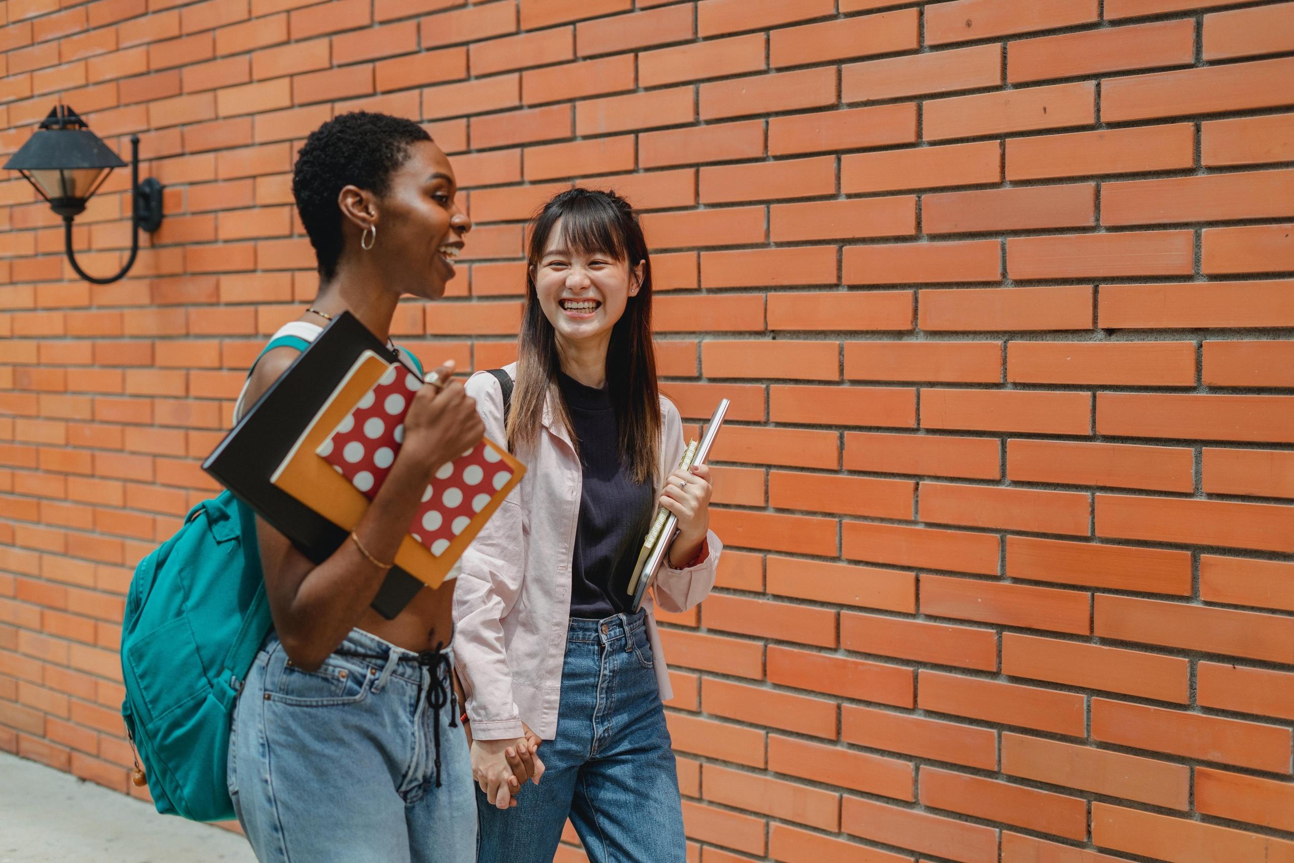 two women walking and talking