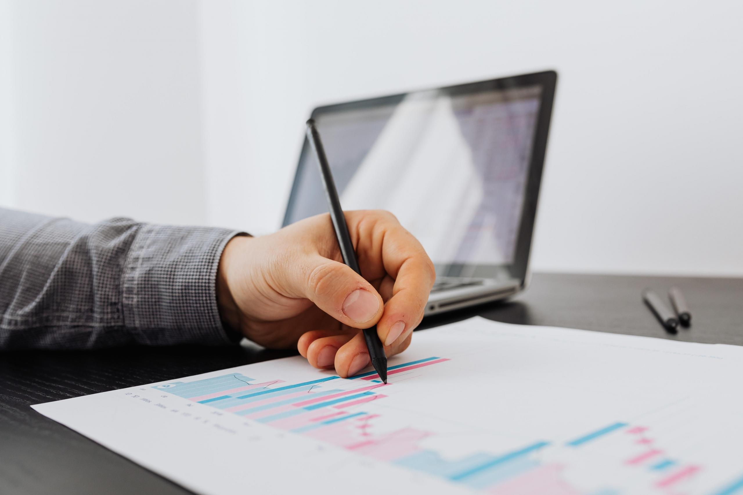 student reviewing statistics and graphs