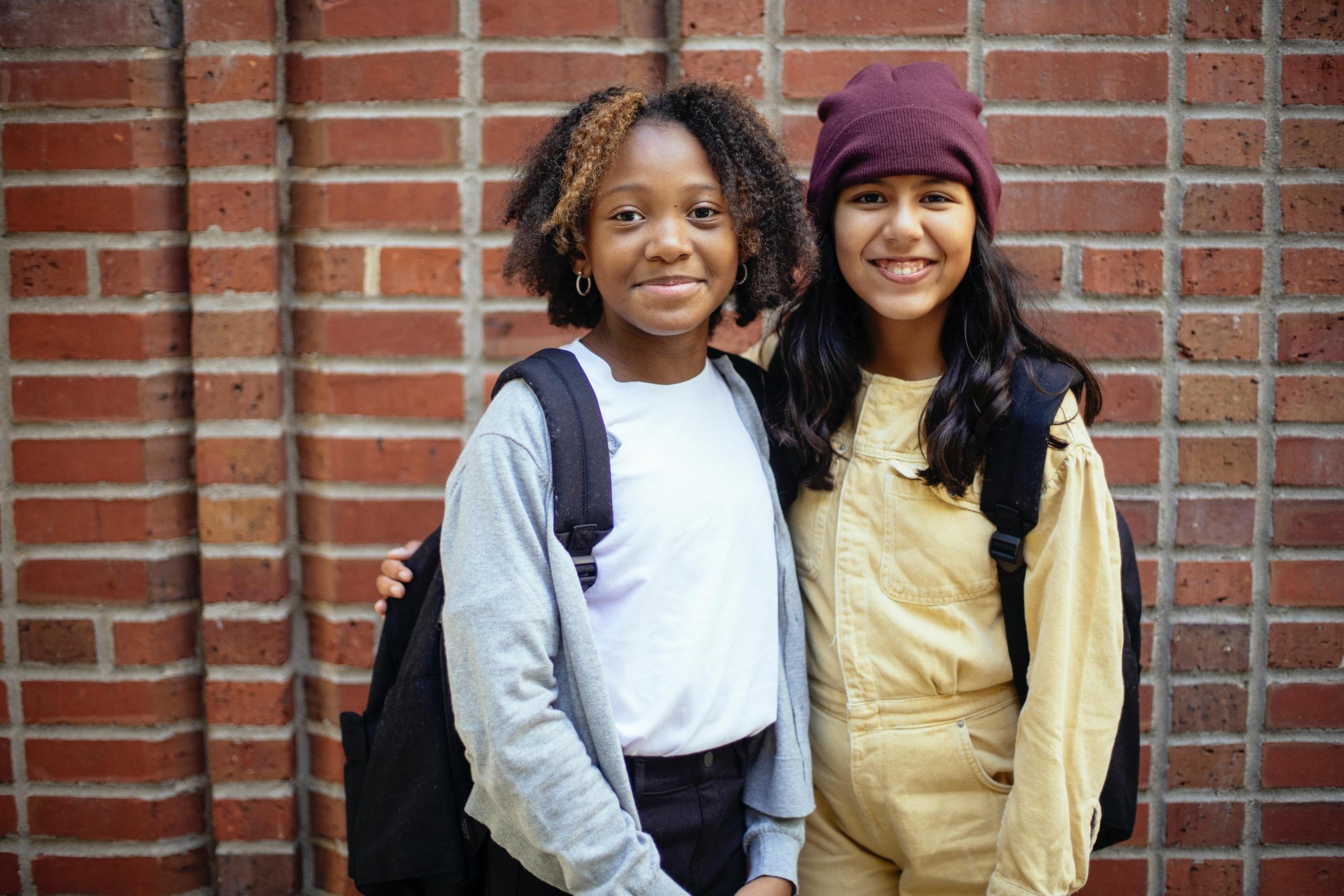 two girls smiling