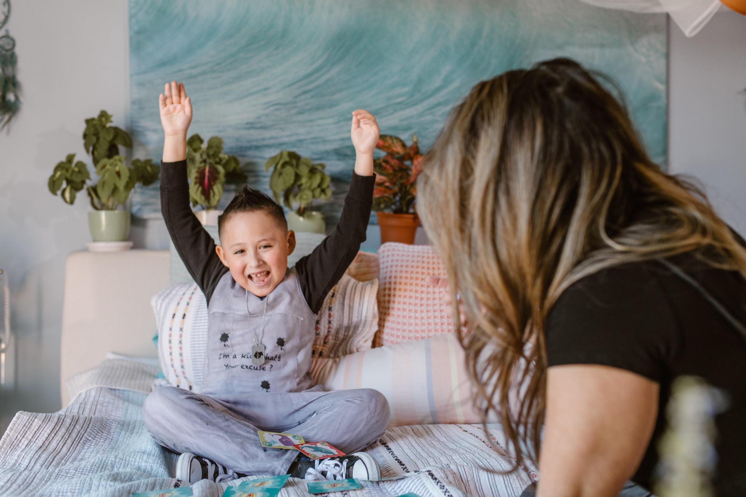 mom and son playing