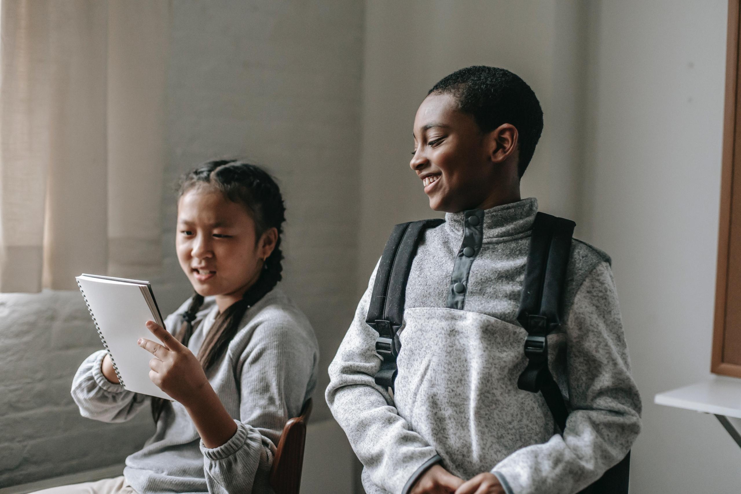 girl and boy learning together