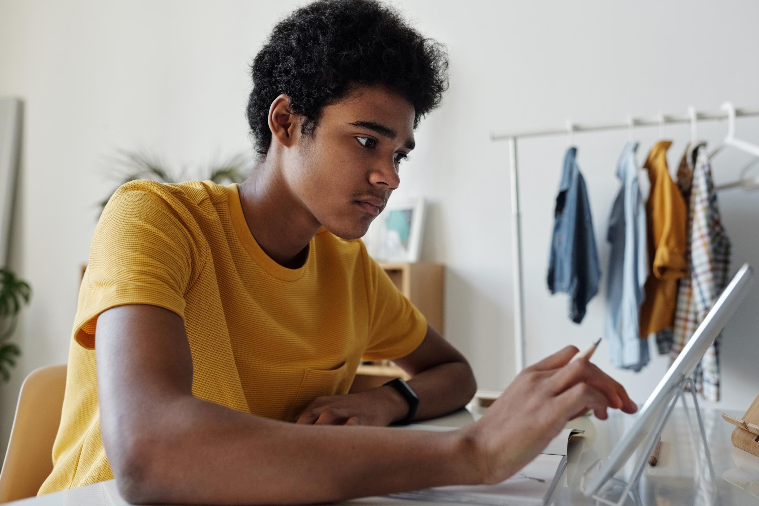 teen using tablet