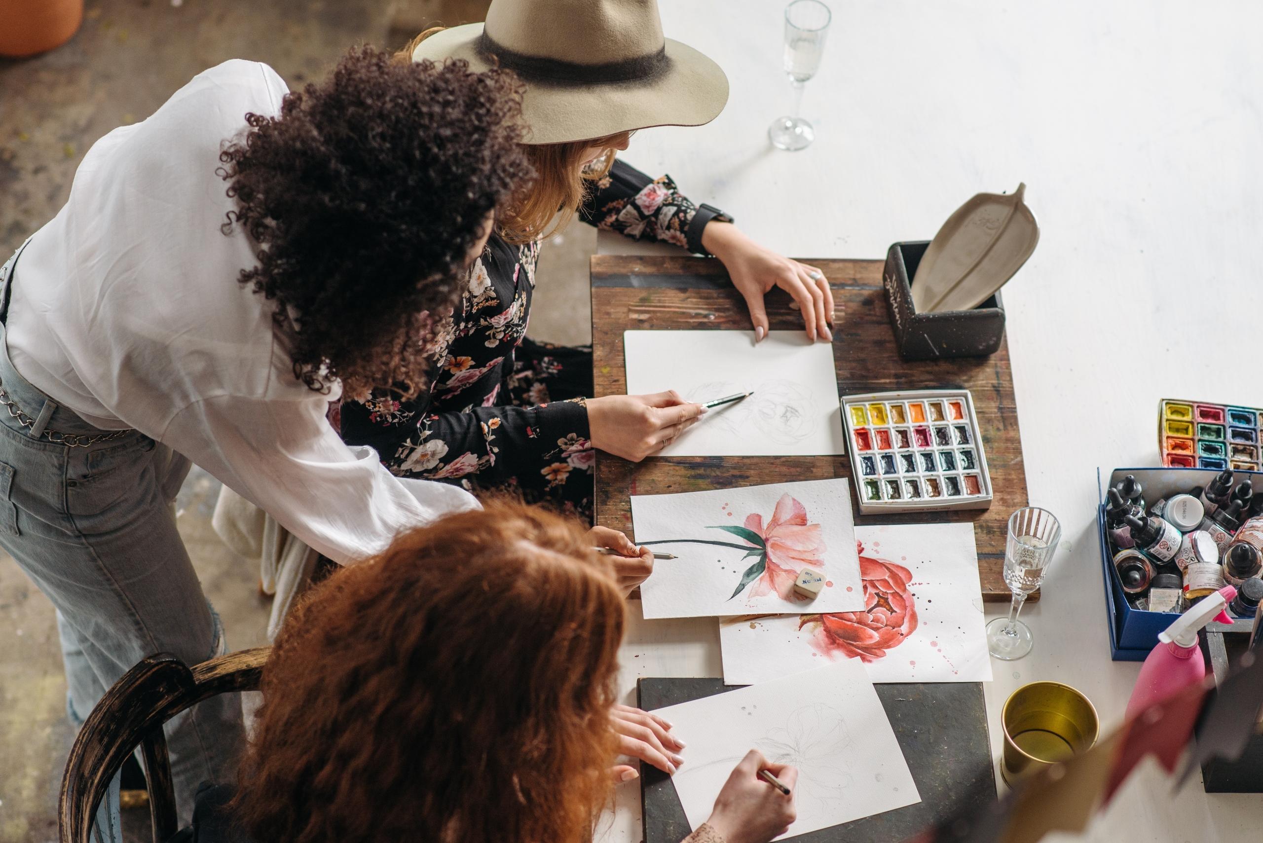 women in lesson on how to paint with watercolour