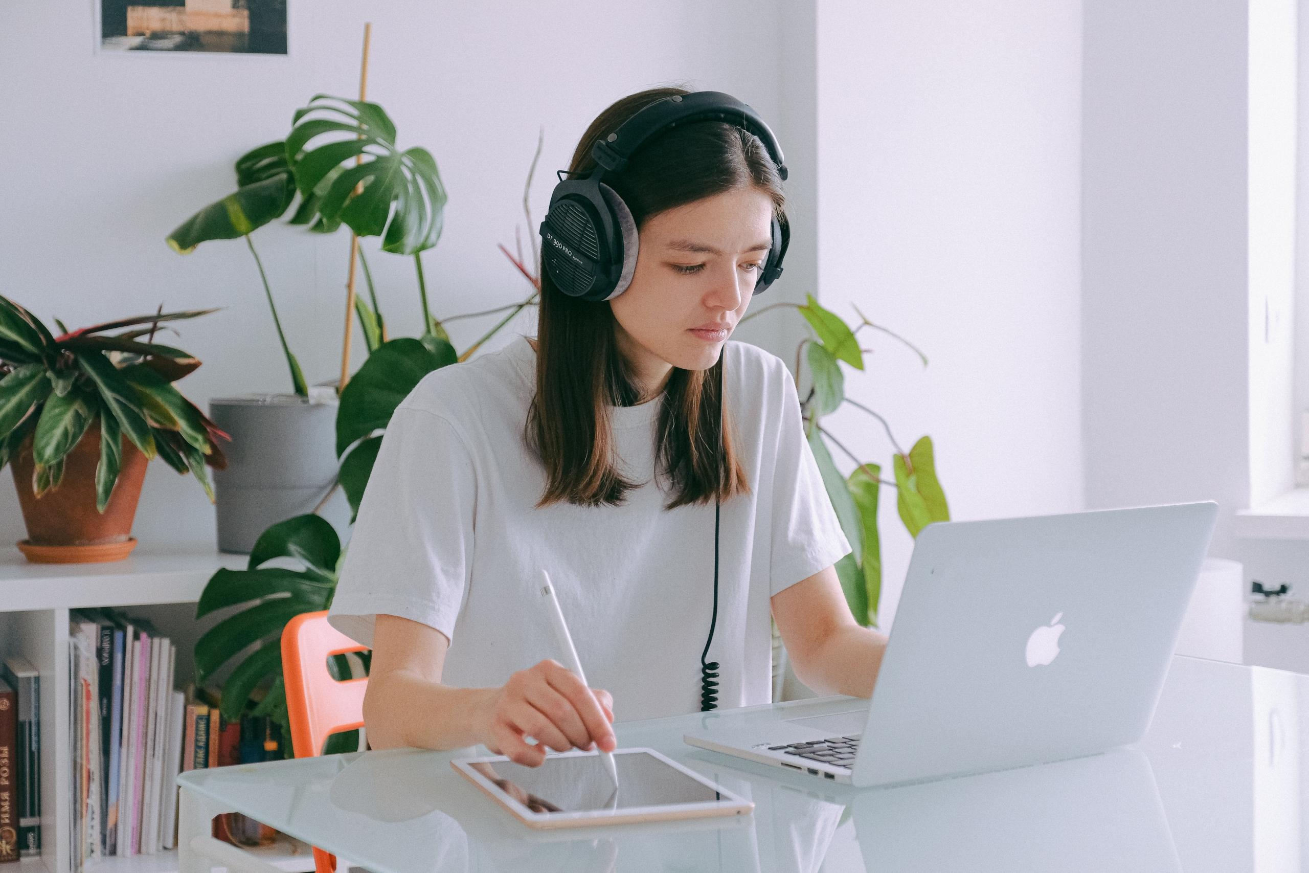 student wearing headphones during online lesson