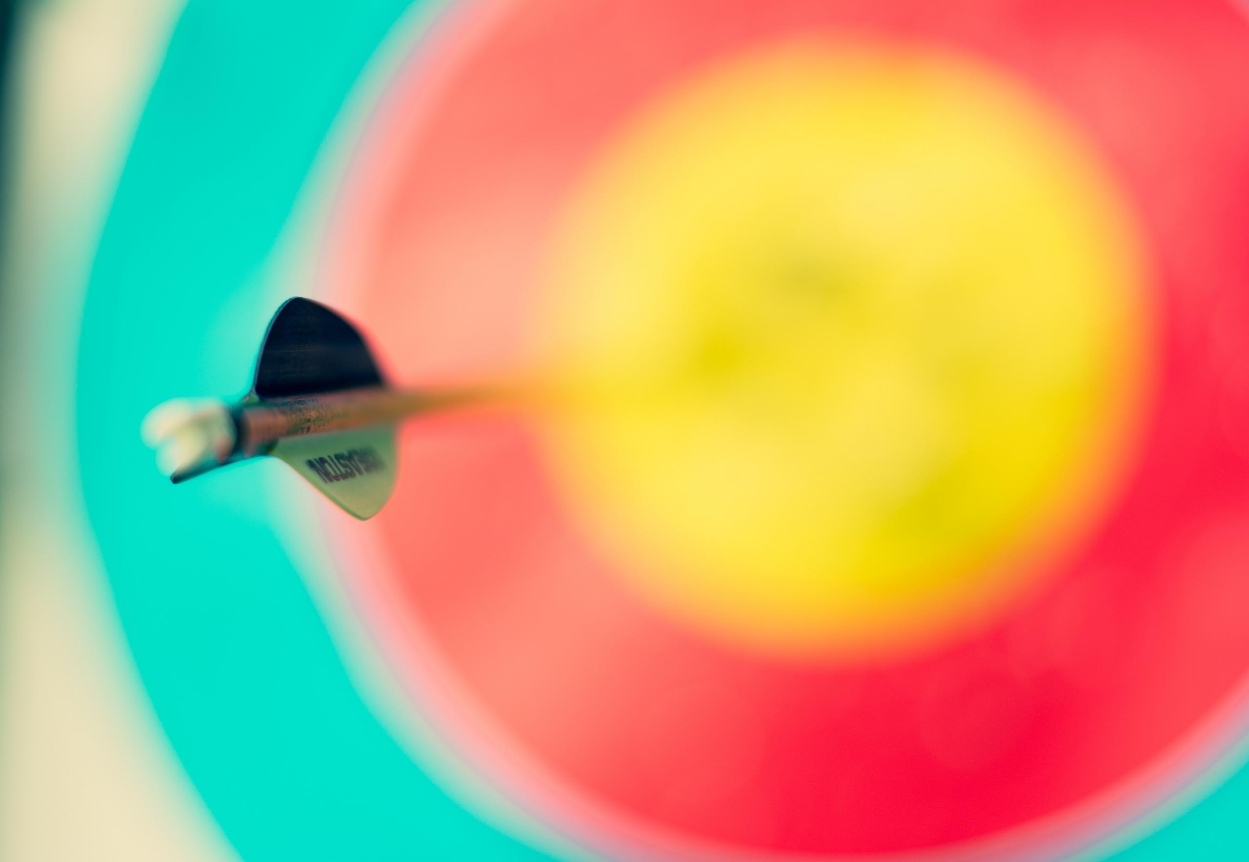 dart hitting bullseye