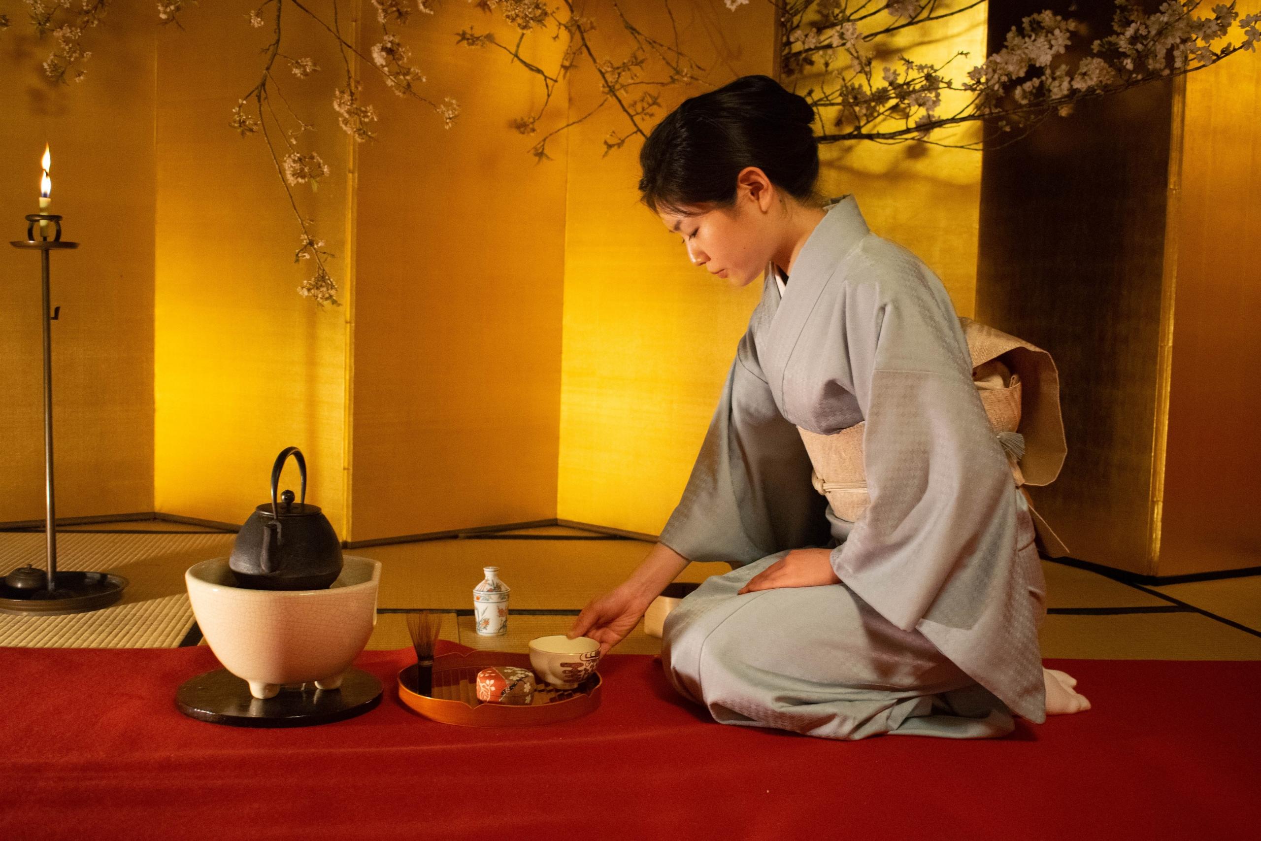 woman performing tea ceremony in Japan