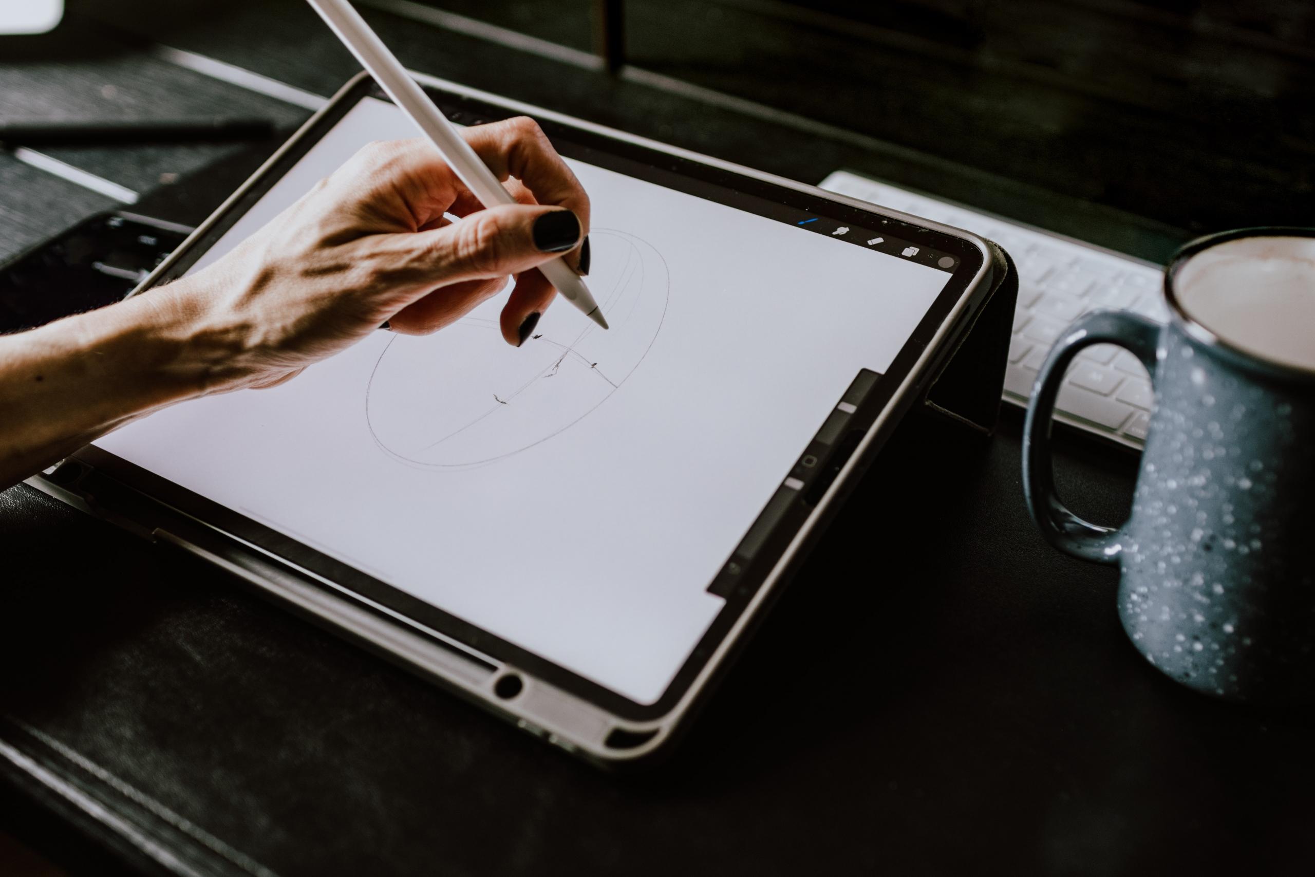 artist creating digital drawing
