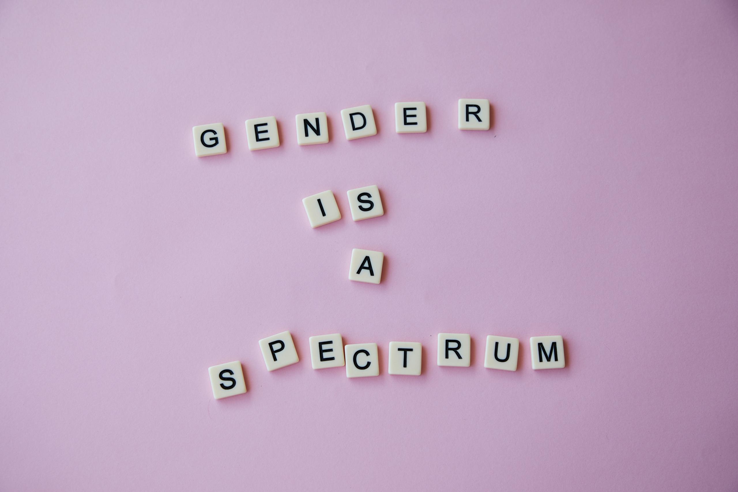 scrabble tiles spelling out gender is a spectrum