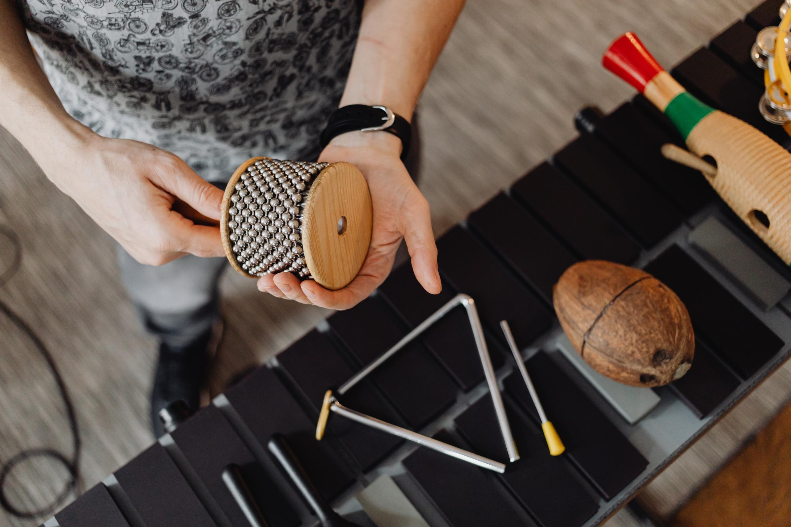 triangle instrument on top of xylophone