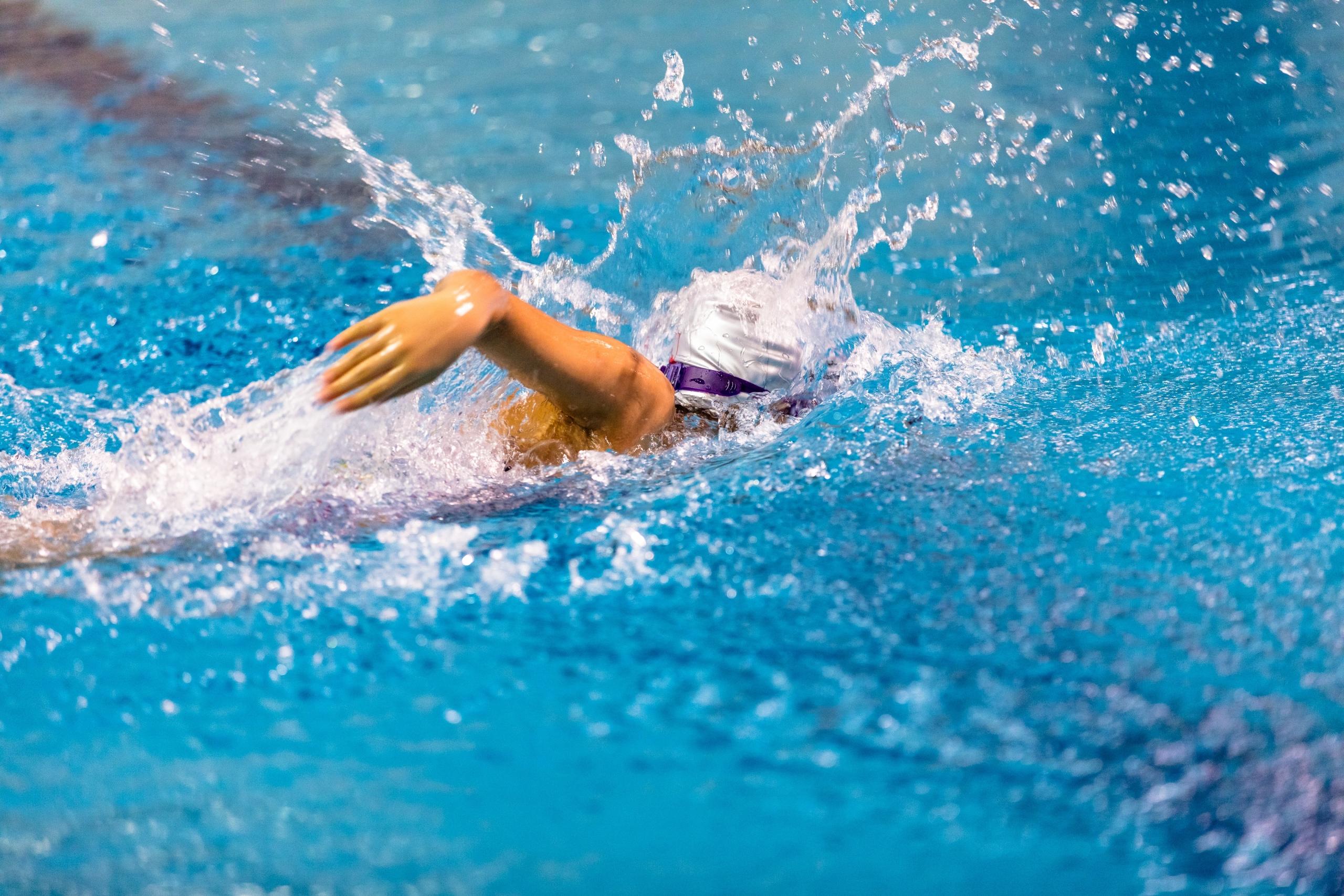 woman swimming in swimming pool