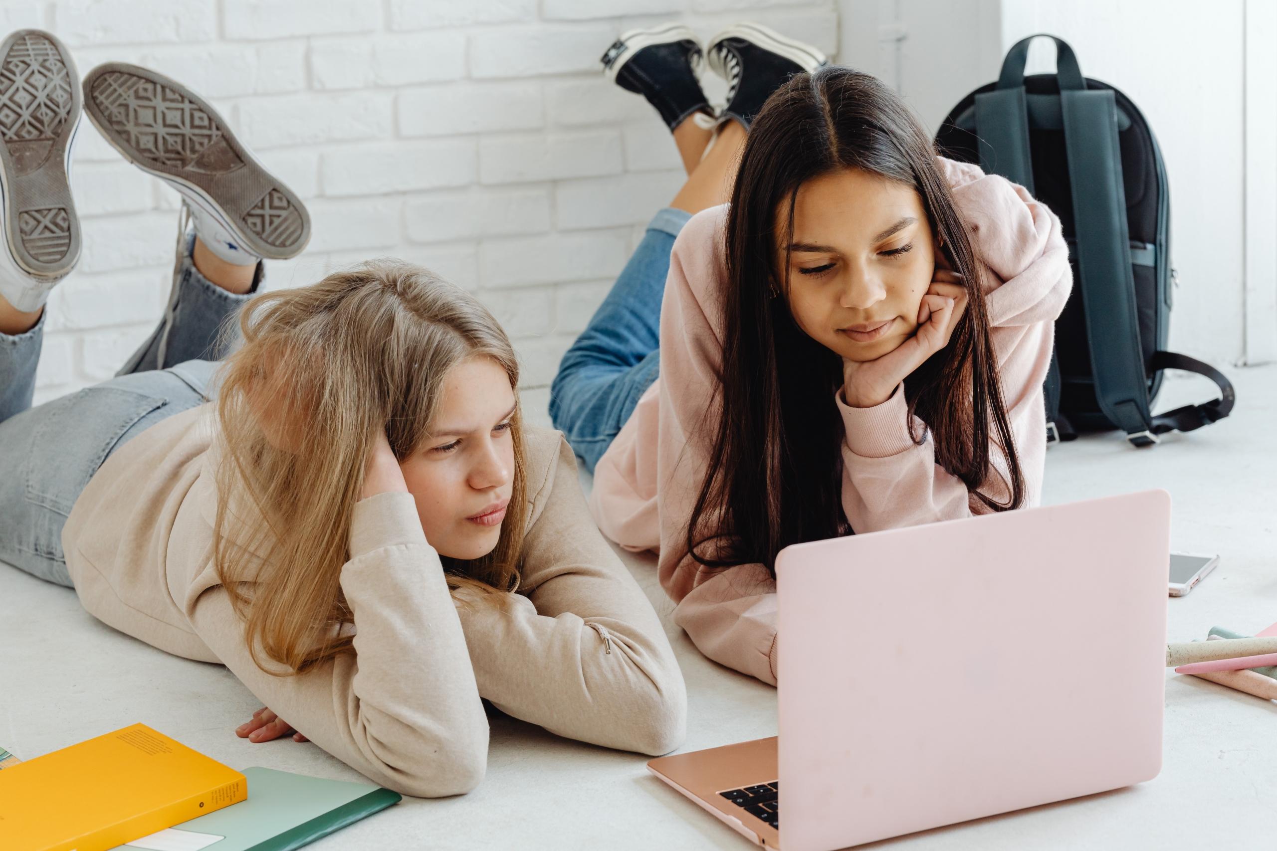 two students using same computer