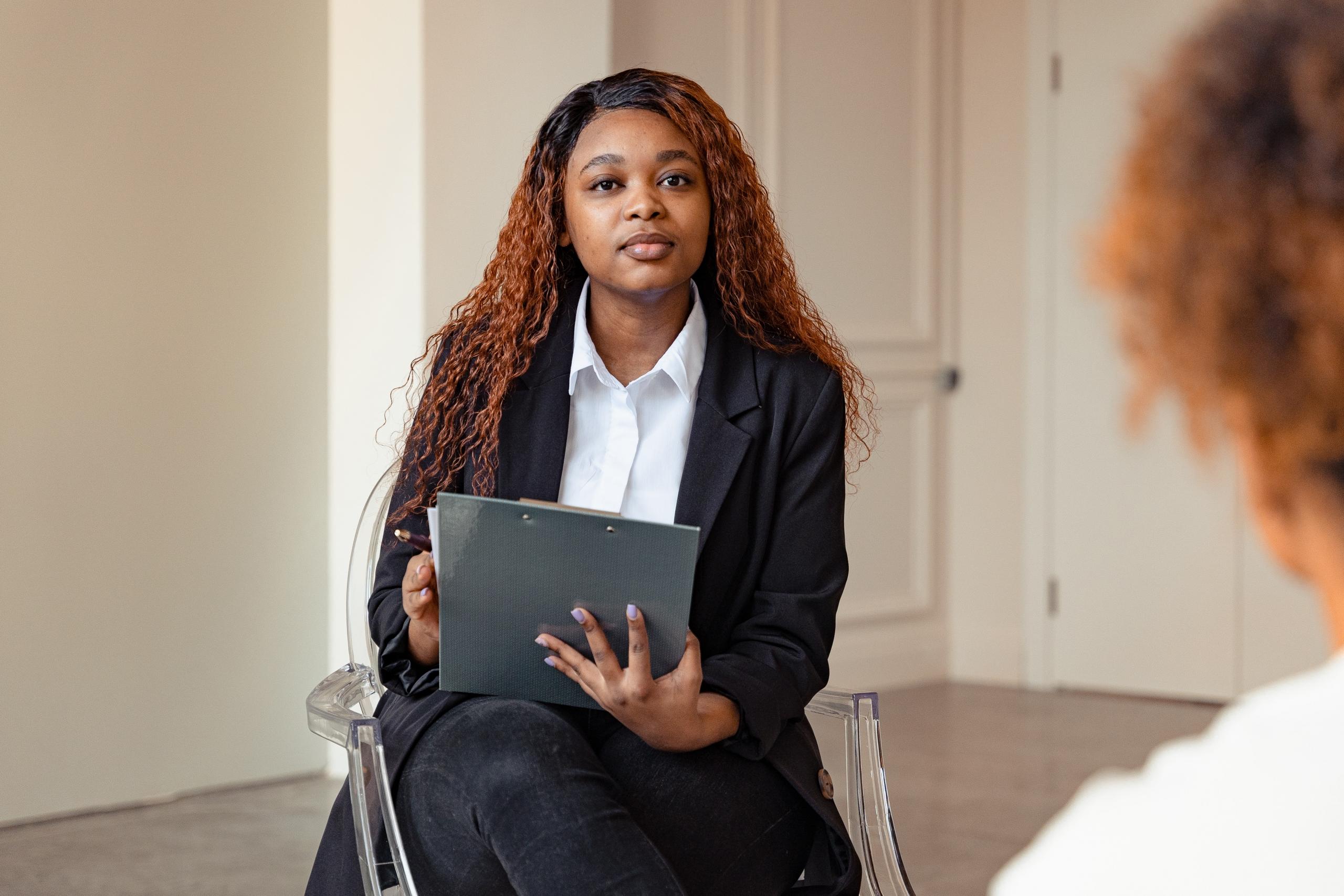 psychologist seated facing patient
