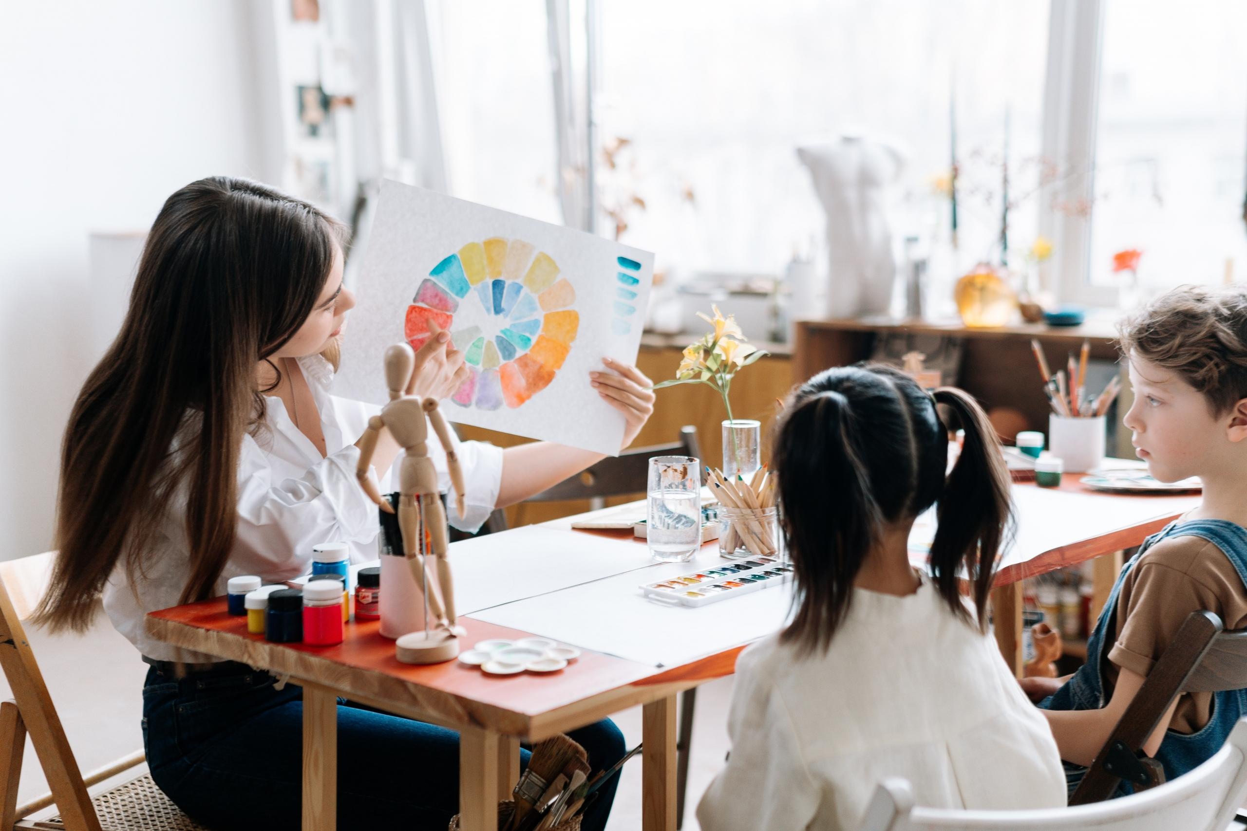students learning about colours in art class