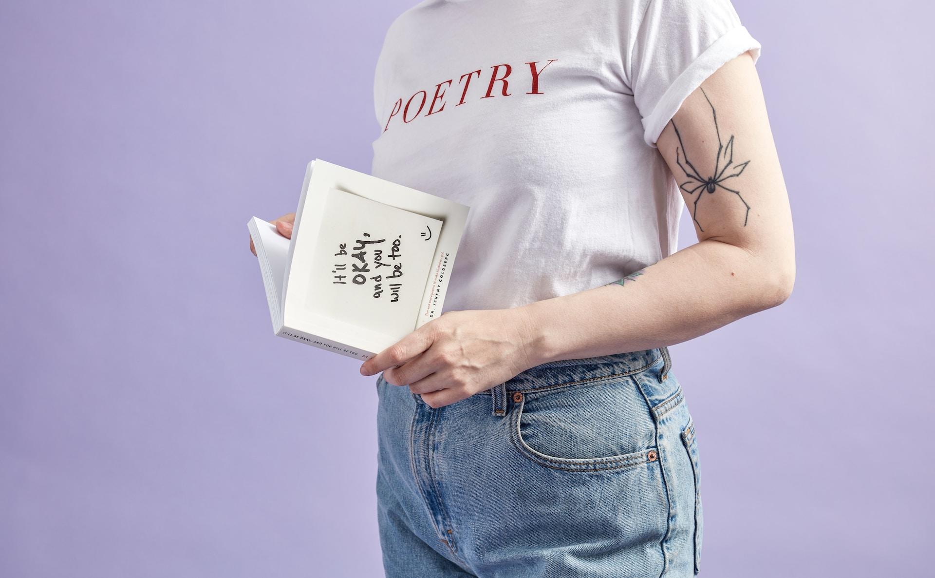 woman reading a poetry book