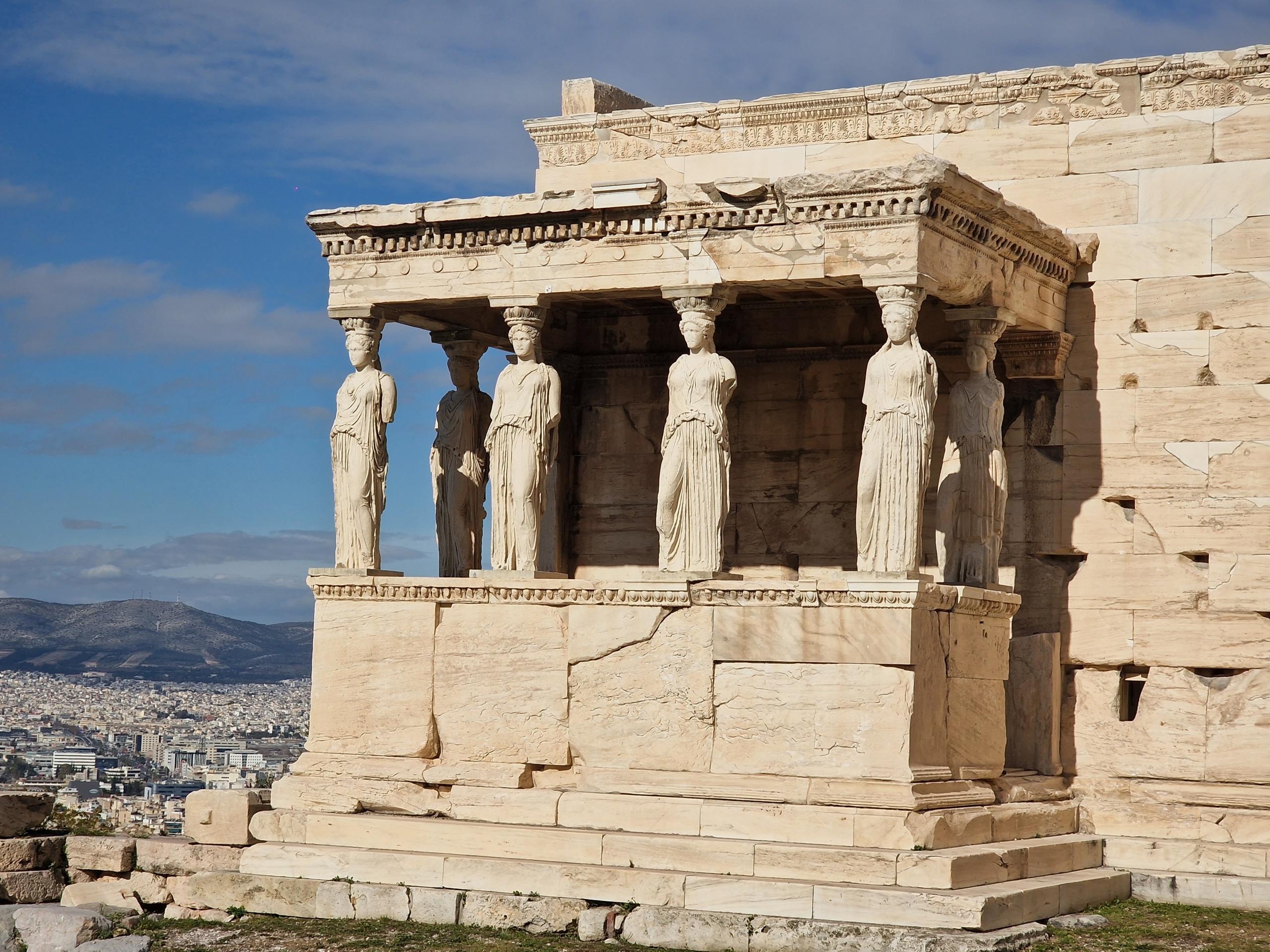 Ancient Greek temple decorated with columns sculpted into human form