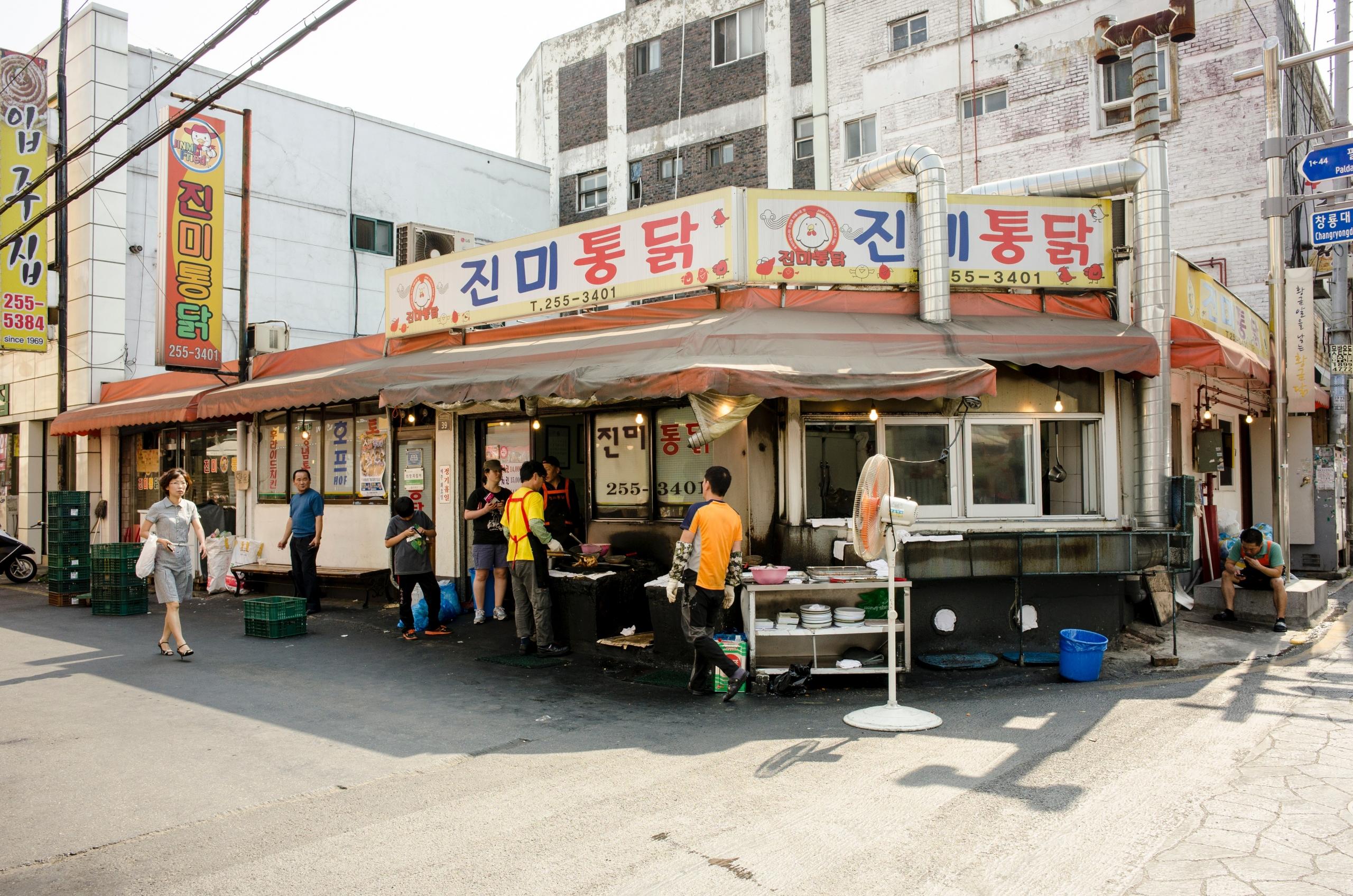 shopfront of a second-hand store in Korea with signs written in Korean