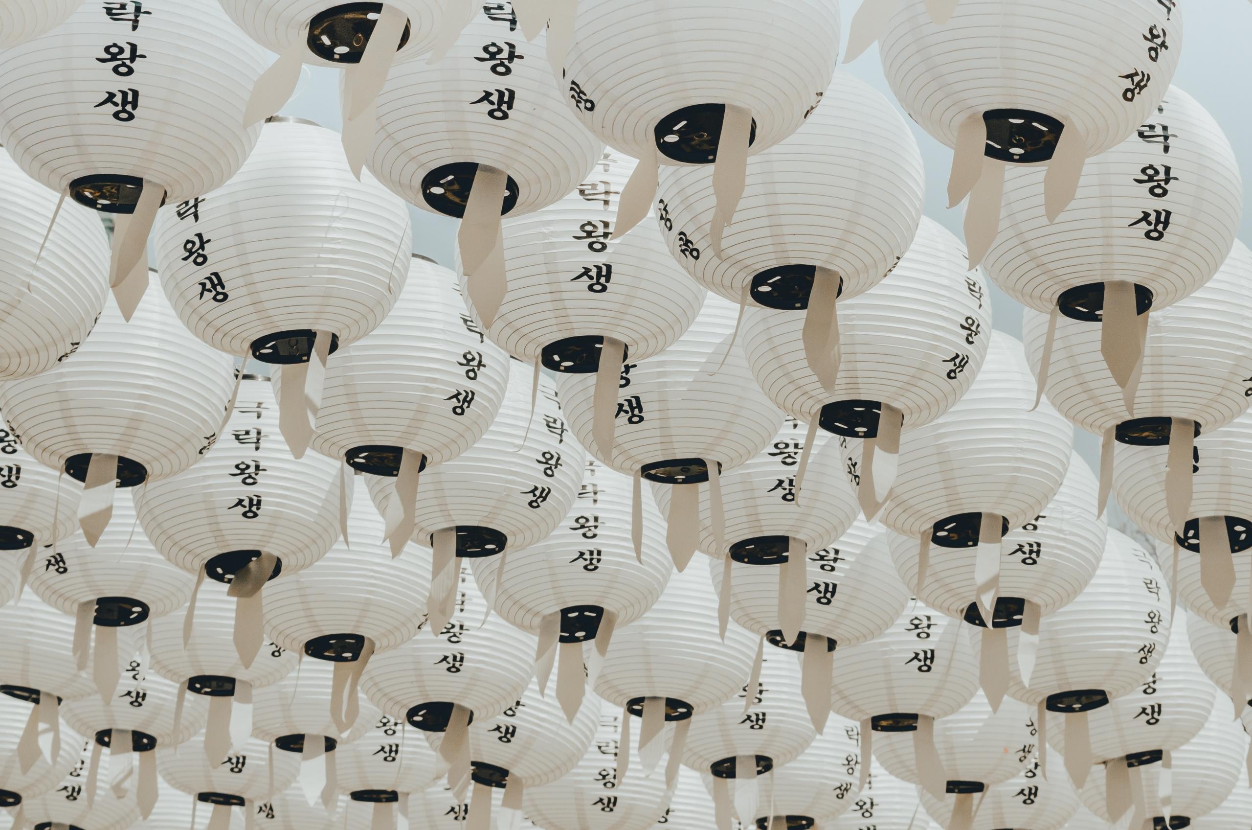 hangul characters on white hanging lanterns