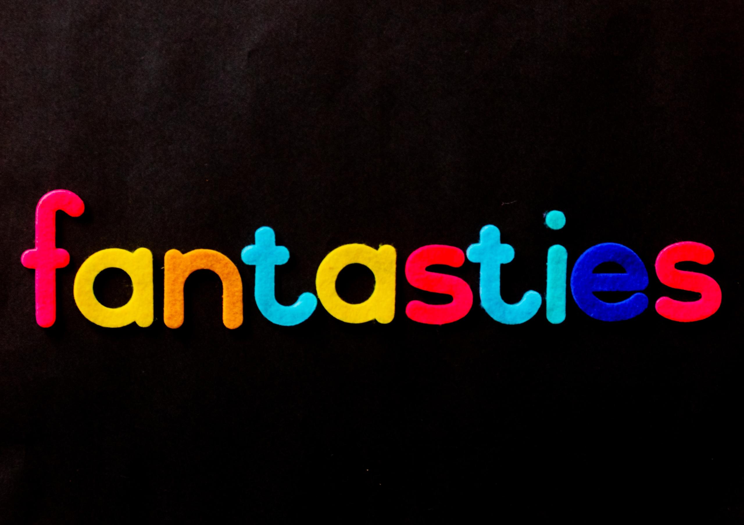 afrikaans word fantasies written in multicoloured felt on black