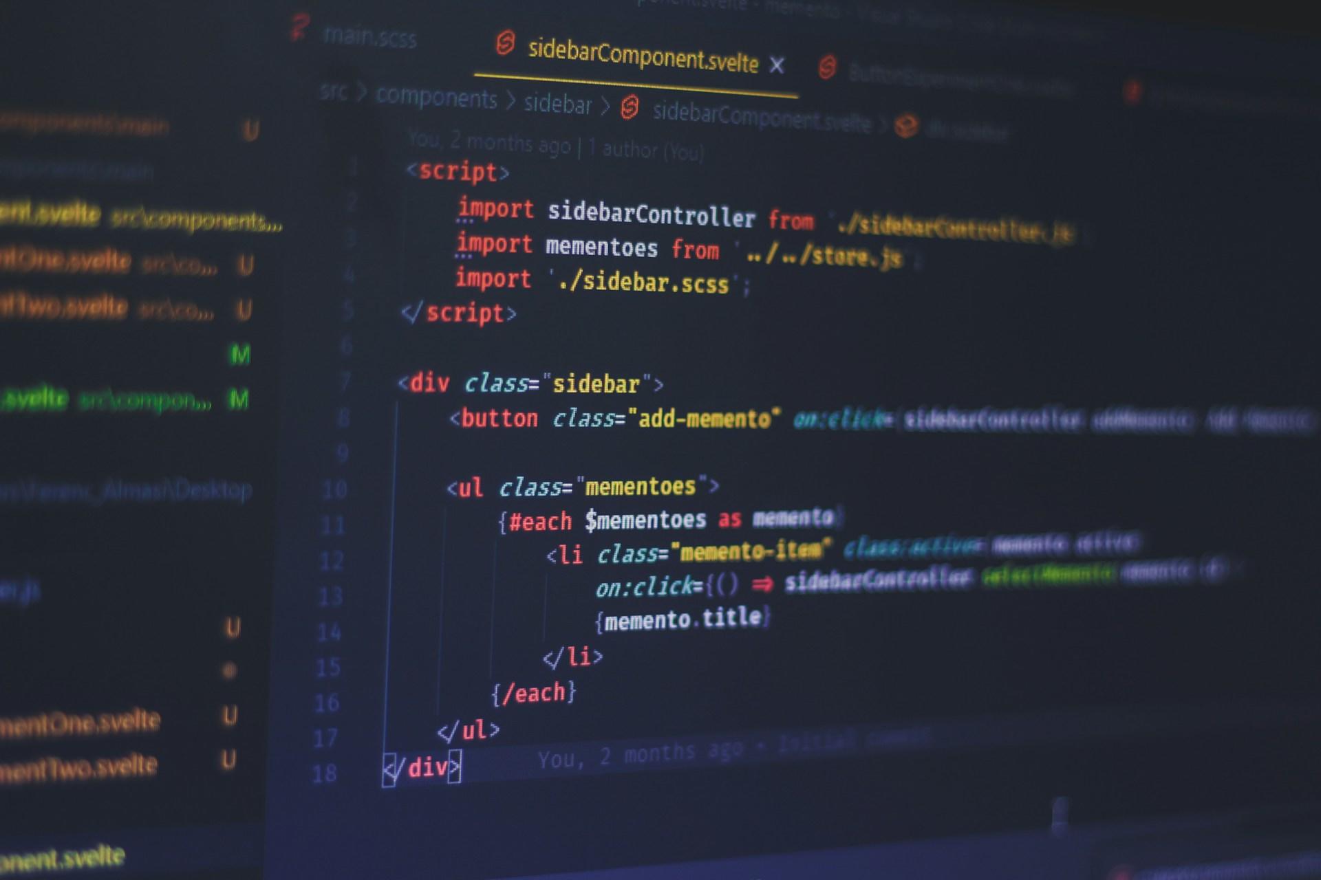 multicoloured lines of code shown on black computer screen