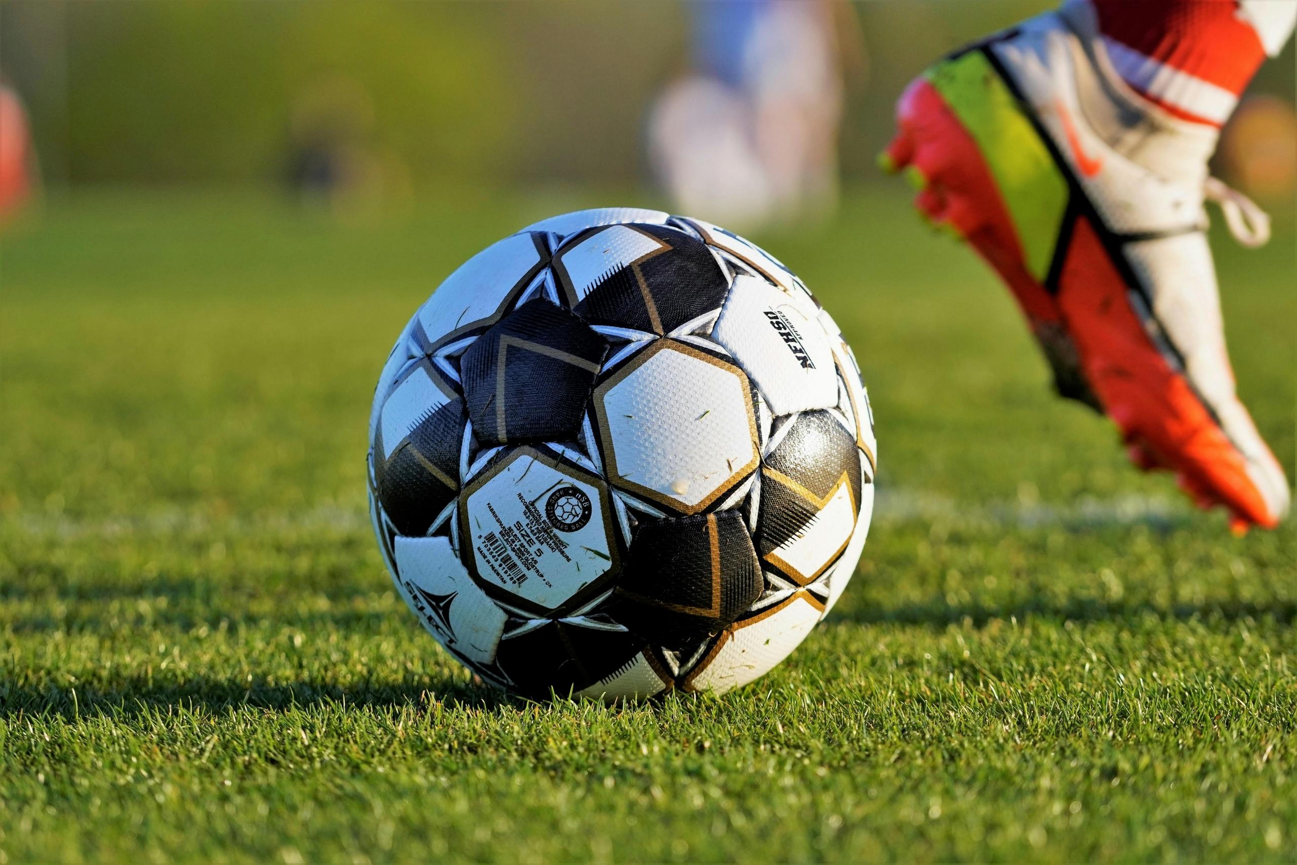 close up of soccer ball on soccer field